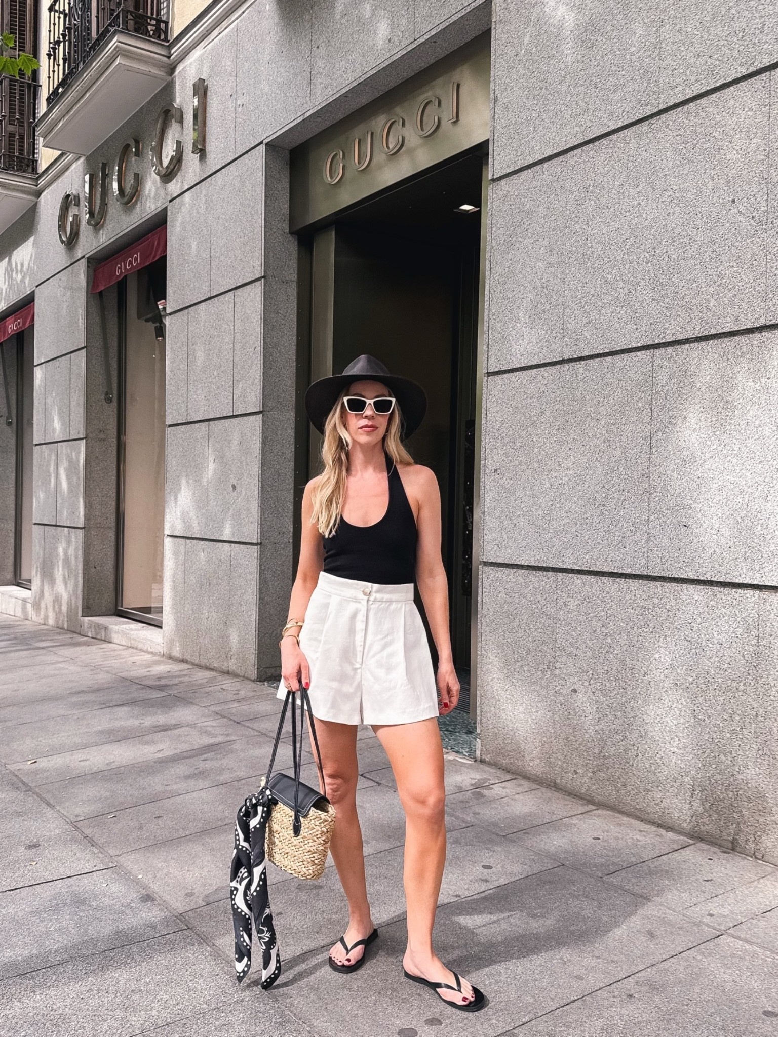 Summer vacation, European summer, travel outfit, black halter top with white linen shorts, leather thong sandals, @Janessa Leone straw hat

#LTKTravel #LTKSeasonal #LTKOver40