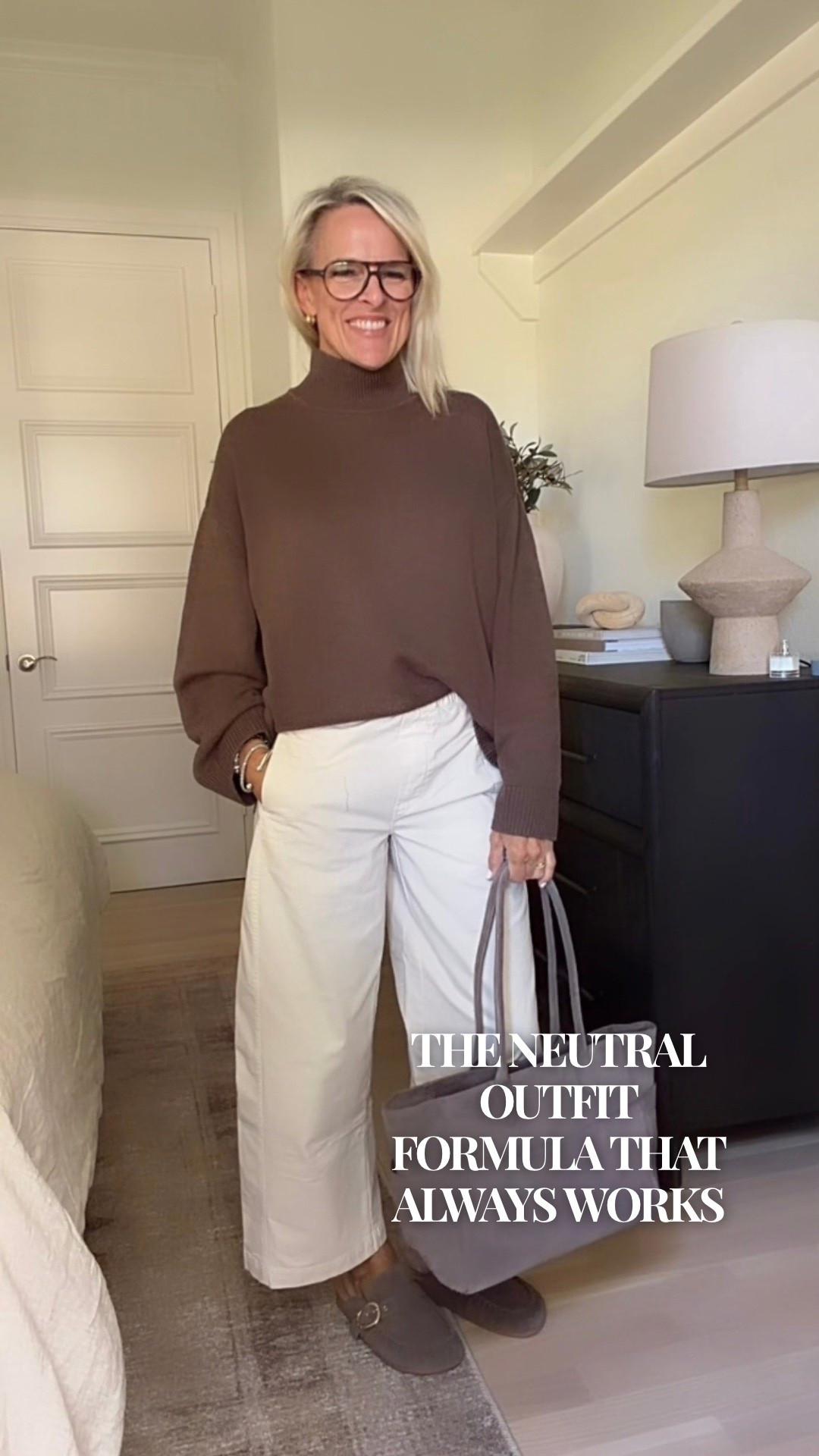 A neutral outfit that feels classic, comfortable, and effortlessly polished. There’s something about pairing a chocolate-brown turtleneck sweater with ivory wide-leg pants that just works. Add classic loafers and an everyday tote, and you have an easy outfit that looks put together without trying too hard.
This is the kind of timeless casual style I love wearing on repeat!