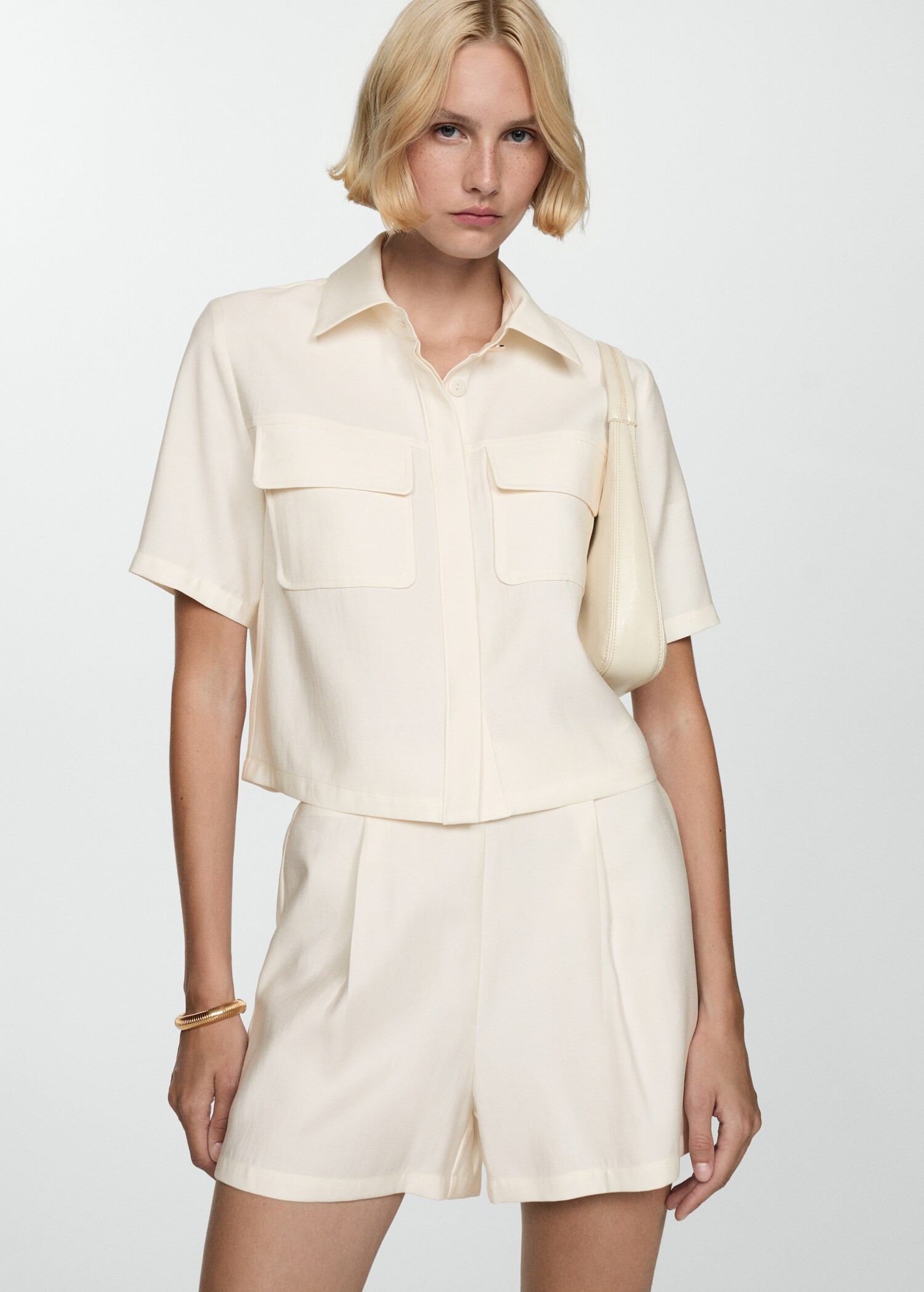 Short sleeve shirt with pockets | Mango (US/MX/AU)