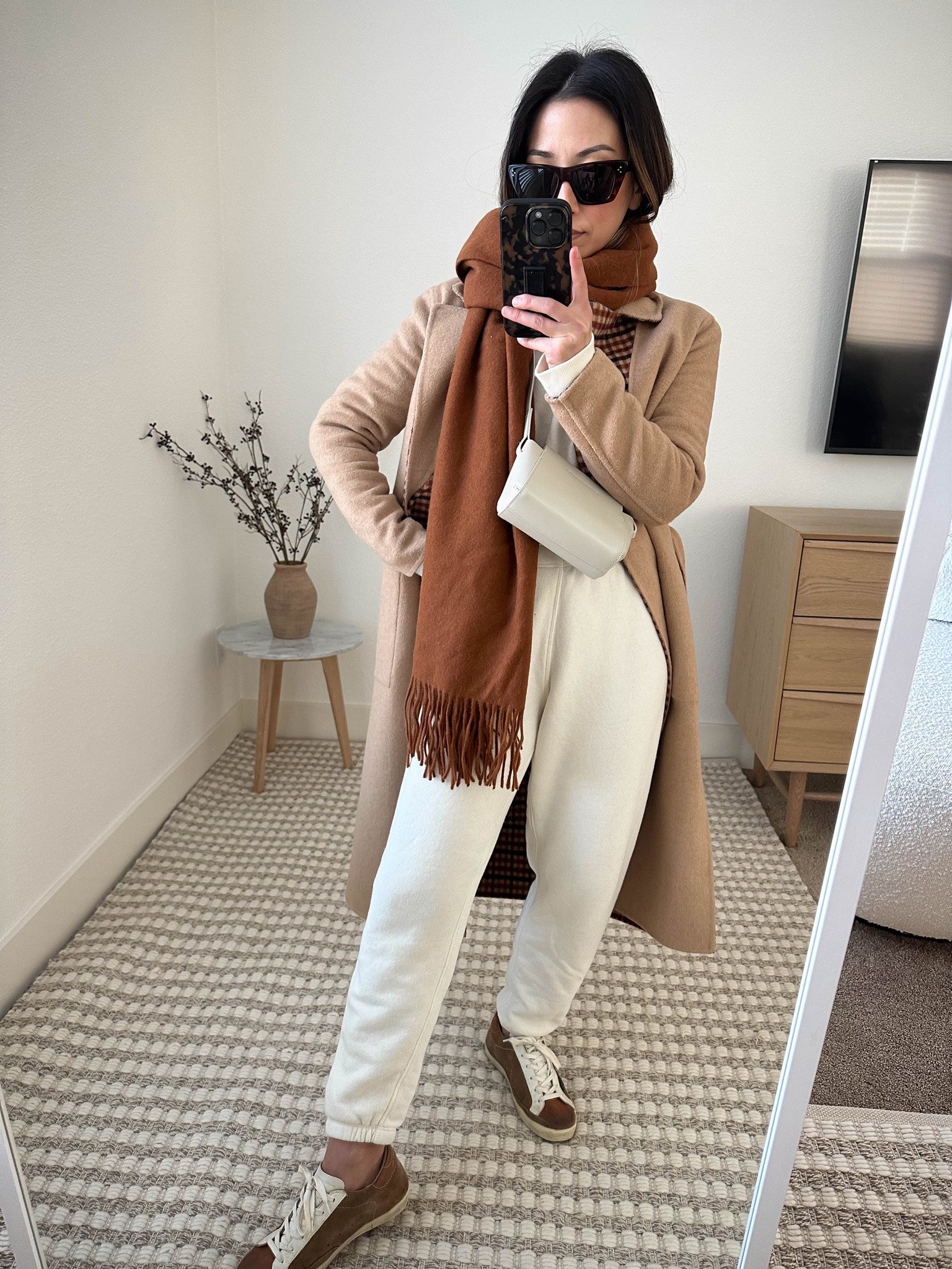 Sandwich style - something on the tops color coordinates with something at the bottom. 

Coat - Banana Republic petite xs (old)
Sweatshirt - Jenni Kayne small
Sweatpants - Jenni Kayne xs
Sneakers - Golden Goose 35
Scarf - Everlane (old)
Crossbody - Everlane (old)
Sunglasses - YSL Mica 

Petite style, tonal style, neutral outfit, capsule wardrobe, minimal Style, street style outfits

#LTKFind #LTKstyletip #LTKshoecrush