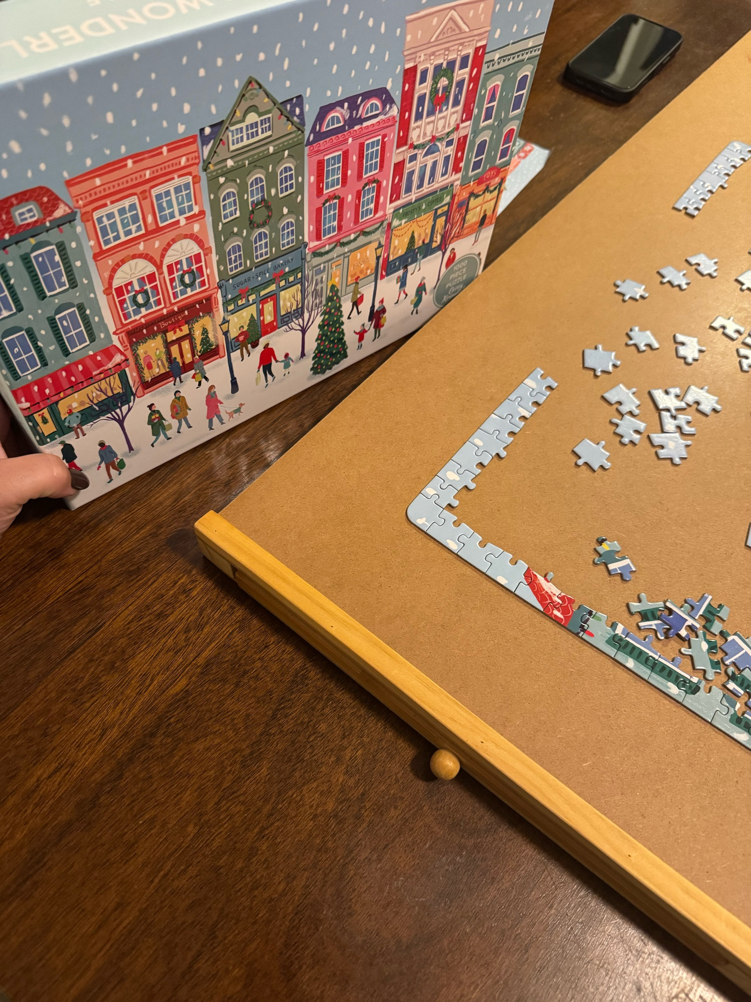 This is what keeps my family busy all winter. We love our puzzle board! #familyfun #winterfun #familyactivities #puzzle #christmaspuzzle #winterpuzzle #puzzleboard #puzzles 

#LTKSeasonal #LTKFamily #LTKHoliday
