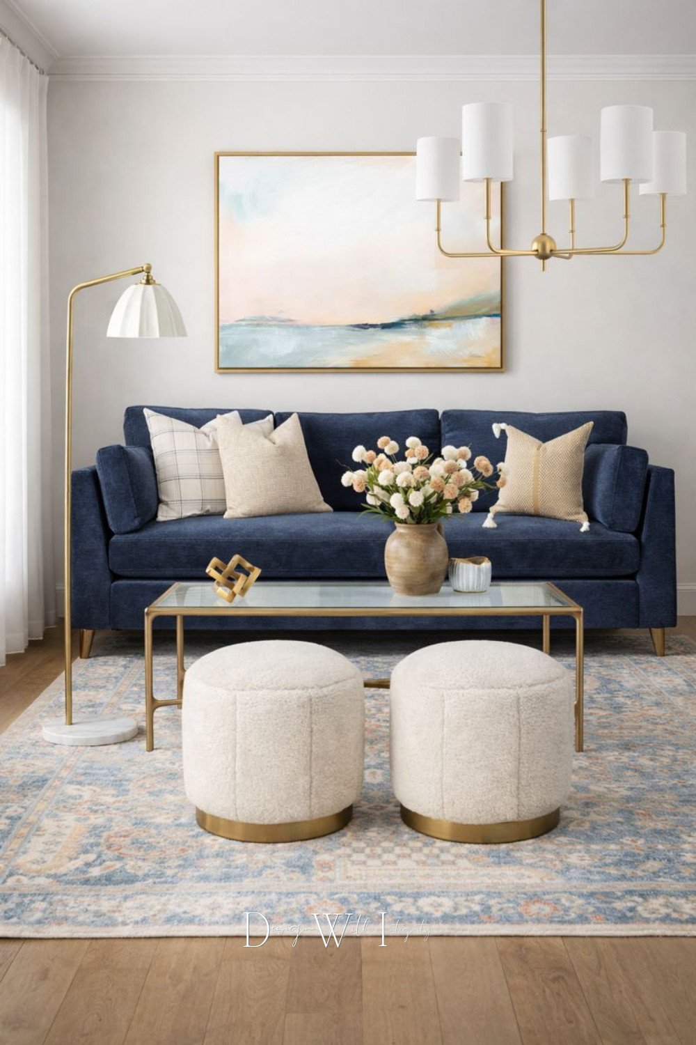 This living room strikes the perfect balance between tailored and inviting. A deep blue sofa anchors the space, softened by layered neutral pillows and warm brass accents throughout. Sculptural lighting, a glass topped coffee table, and plush ottomans create a polished yet comfortable setting that feels timeless rather than trendy. Every detail works together to create a space that feels elevated, calm, and thoughtfully styled.

Inspired by a digital mood board and brought to life through AI, this design offers a fresh take on classic living room styling with pieces that translate beautifully into real homes.

Shop the look on LTK to explore the curated selections featured here.

Images shown are for inspiration and were generated via AI from a digital mood board.

#livingroominspo
#interiordesign
#shopthelook 

 #LTKHome