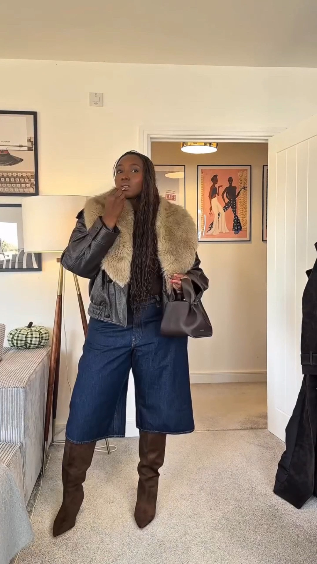 Serving luxury layers, plus-size chic, and cold-weather glam in this faux-fur collar, leather jacket, denim jorts, and knee-high boots. Effortless, bold, and unapologetically stylish. ✨

Comment shop for outfit details. 
#PlusSizeStyle #MidSizeFashion #CurvyOutfits #WinterStyleInspo #ChicAndCurvy