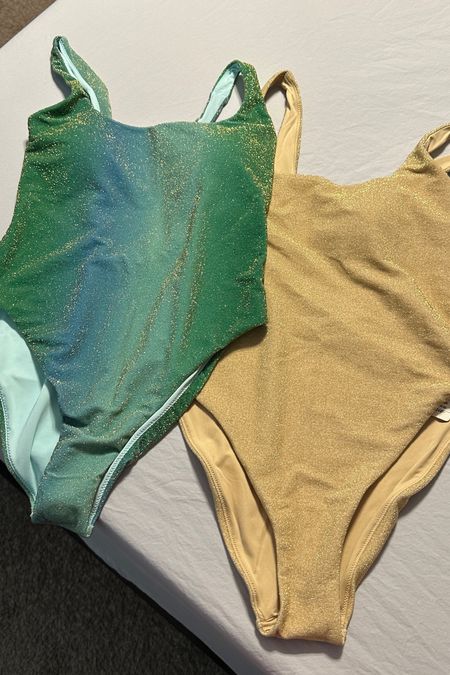 Glitter swimsuits!! And they are currently 60% off. They are so fun and sparkly! I bought both in a medium. There is also a few two pieces as well.

#LTKtravel #LTKswim #LTKunder50