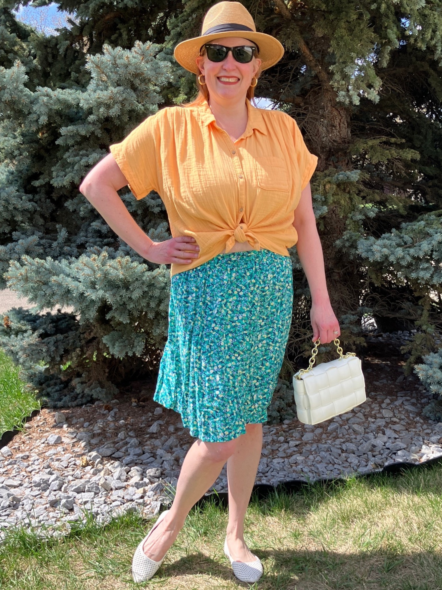 I’m only human, so I repeat parts of my outfit all the time! This shirt is part of a two piece set I wore last week. This time I teamed it up with white accessories, cute sunnies, a hat, and a patterned skirt. You really don’t need more clothes, you just need to style them better. It’s definitely a learning process, but like anything you can get better at it the more you try! Canadians click on the first links to shop, and Americans click on the second links to shop. If there’s only one link then you can shop it in your own country. And remember, trendy doesn’t have to be expensive! Bye!

#LTKsummer #LTKmidsize #LTKover50style