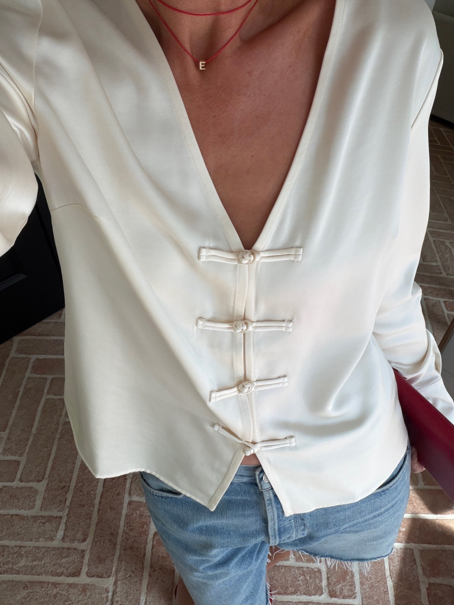 New in Aligne top | frog fastening detail, 90s minimalism, Aligne satin top, ivory satin blouse, frog fastening top, deep V neckline, going out top, elevated basics, autumn wardrobe update

#LTKFashionMonth #LTKuk #LTKdatenight
