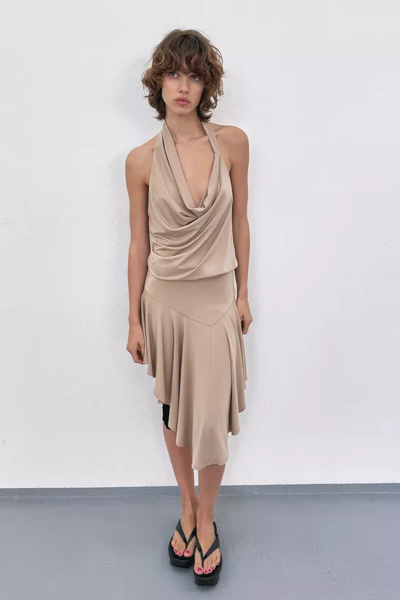 Halter neck dress with draped neckline. Ruched detail and open back. Asymmetric hem. | Zara US