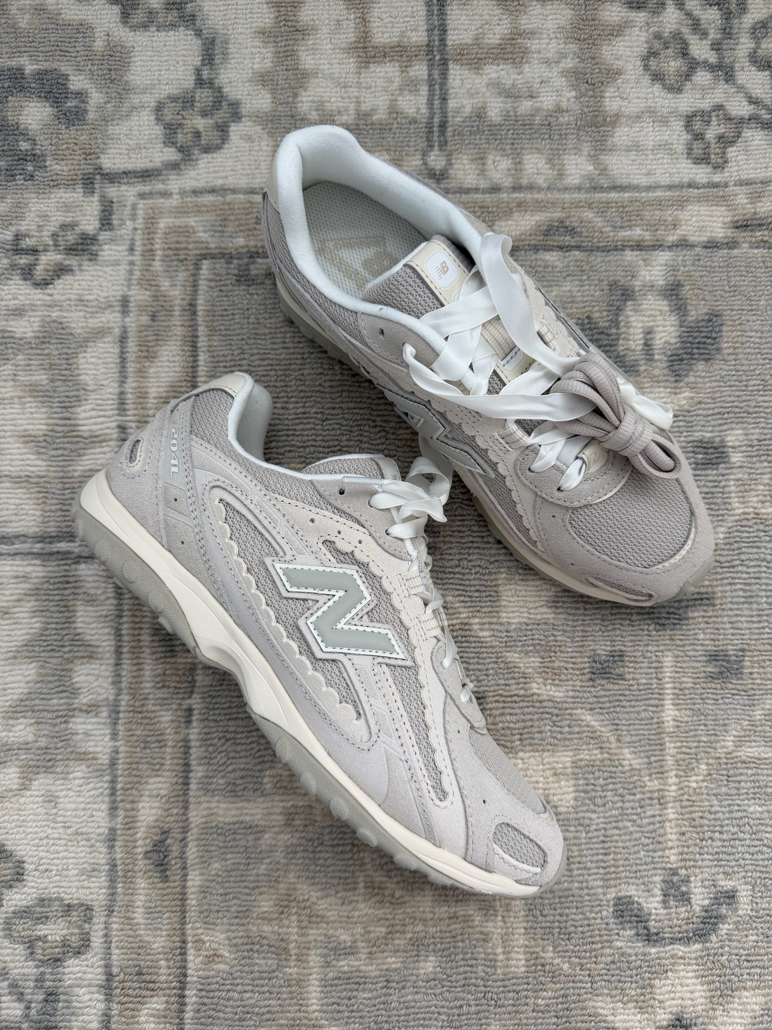 Most shopped shoes this week!! Such a cute scalloped detail and comes with two lace options. I personally love the ribbon option! I got my normal sneaker size. They have a lower profile on the ankle so they don’t look clunky.

#LTKmomlife #LTKSeasonal #LTKActive