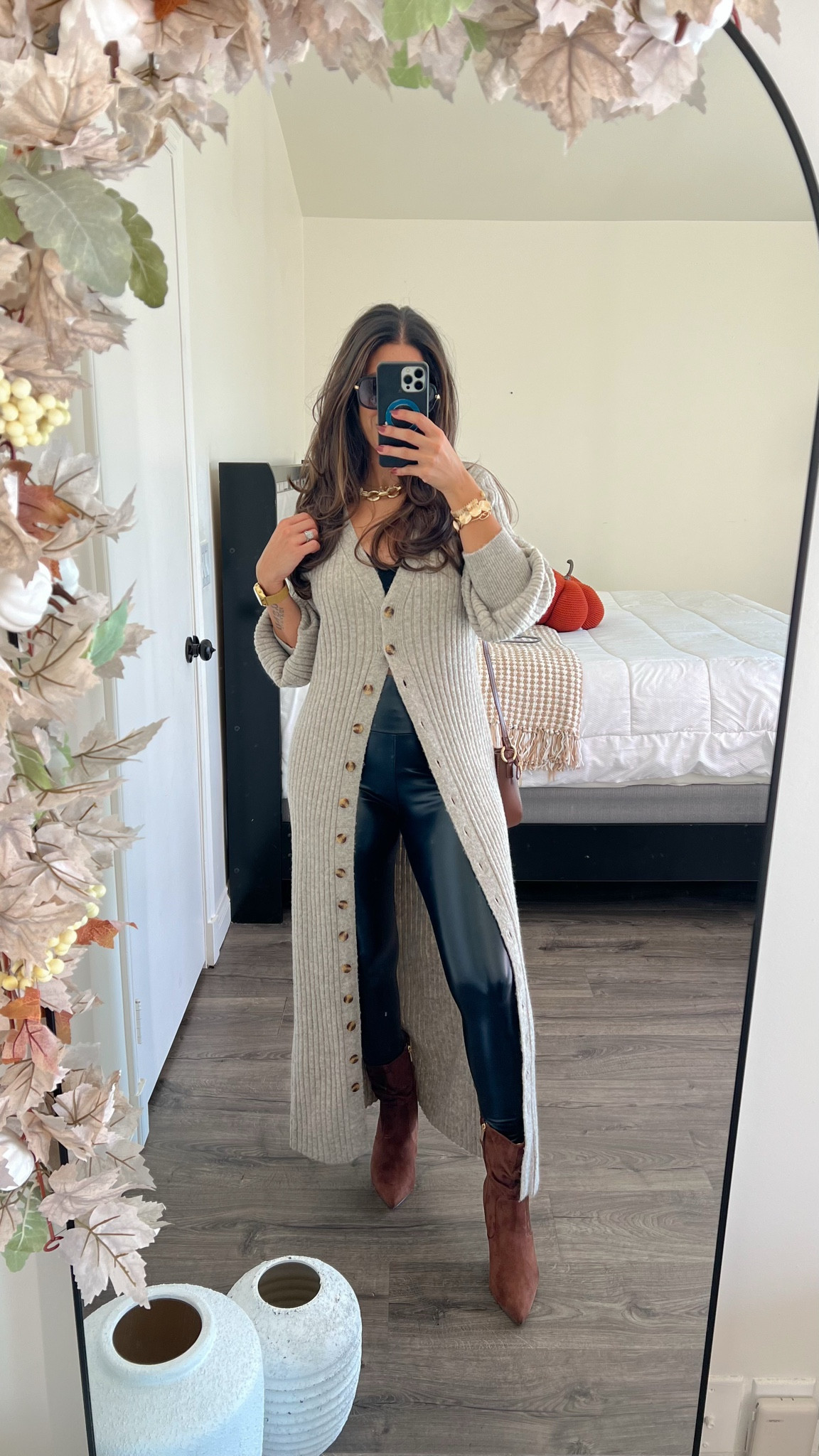 Casual chic Thanksgiving outfit idea with leather leggings, wearing small in the cardigan and medium in the leggings

#LTKHoliday #LTKFindsUnder50 #LTKStyleTip