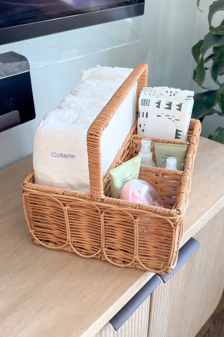The cutest rattan diaper caddy! Honest diaper wipes, coterie diapers, honest soothing bottom wash, hand sanitizer, pipette diaper rash cream, pipette eczema cream, electric nail file for baby, baby products, baby must haves

#LTKfamily #LTKfindsunder50 #LTKbaby
