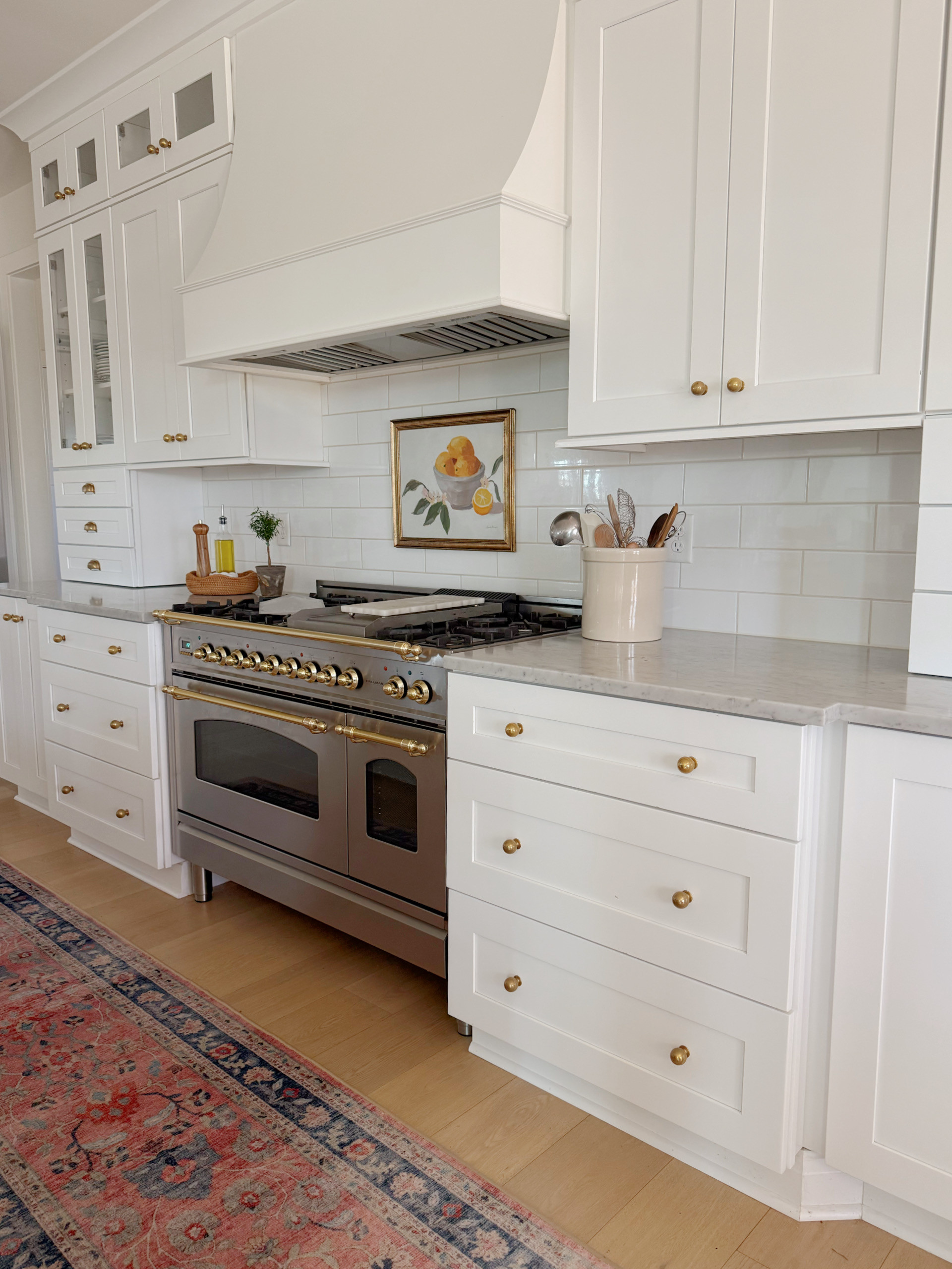 Our traditional white kitchen in winter - I love switching out the runner based on seasons and this one from Ruggable is warm and cozy for the winter.

#traditionalhome #kitchenstyle #southernhome #kitchenrunner #washablerug #ruggable #whitekitchen #kitchenstyling 

 #LTKHome