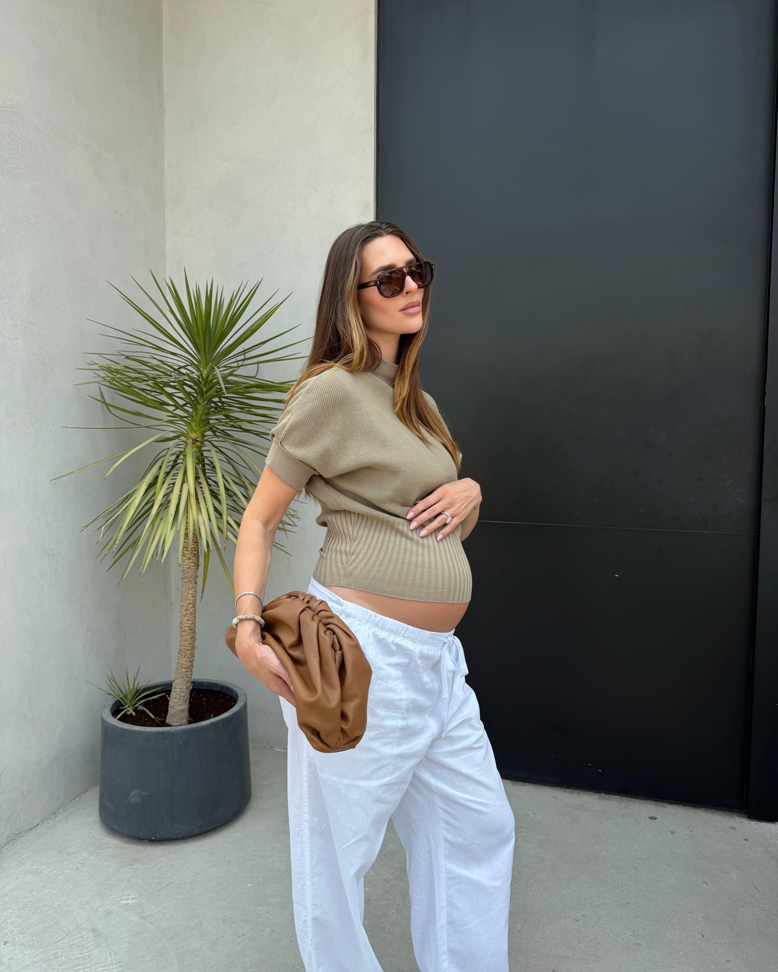 Zara knitted top, linen trousers with drawstring, jacques Marie mage sunglasses, Bottega Veneta pouch bag