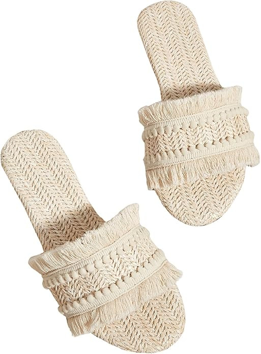 OYOANGLE Women's Fringe Straw Sandals Crochet Open Toe Single Band Flat Slip On Sandals | Amazon (US)