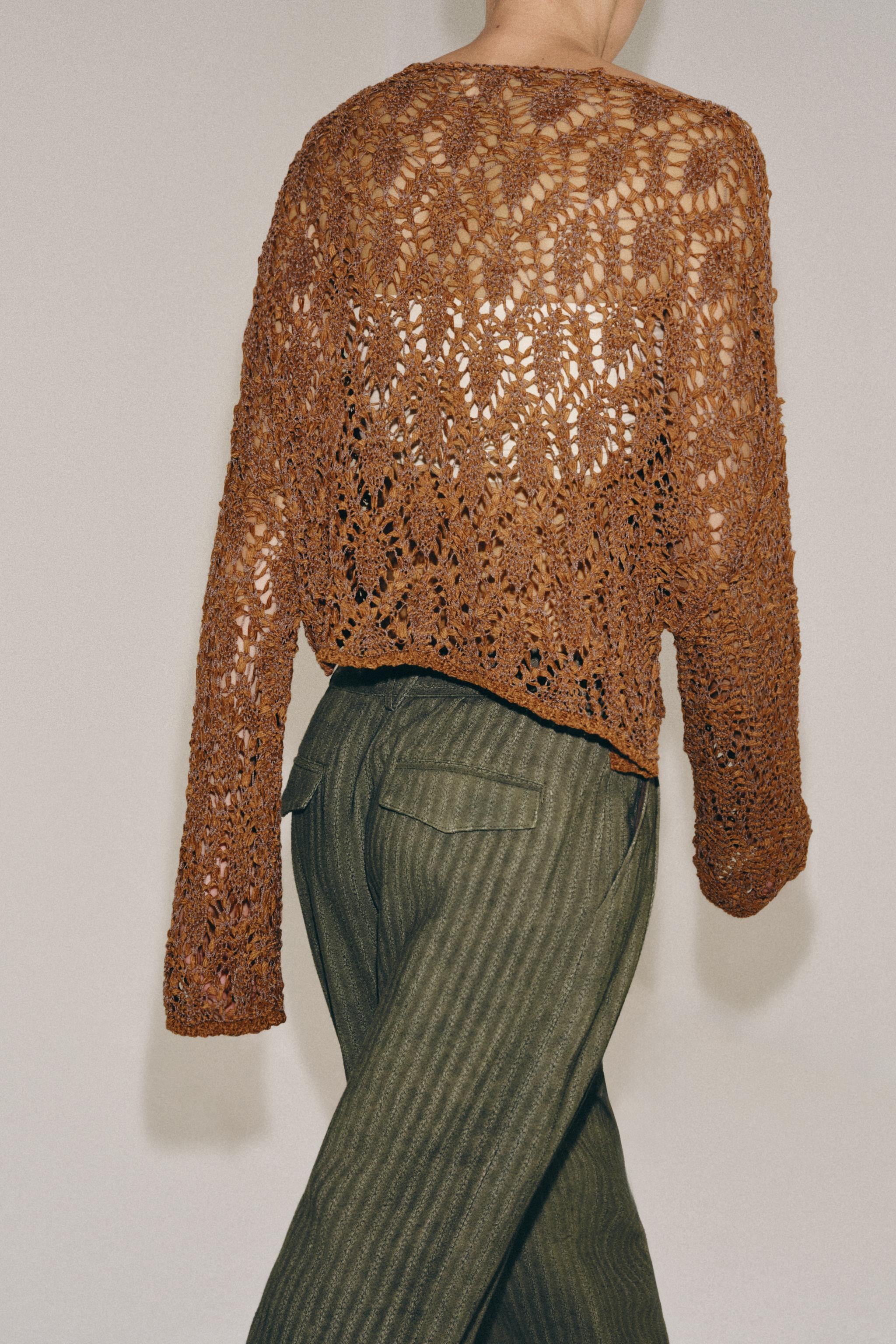 Cutwork knit jumper with a boat neck and long flared sleeves. | Zara UK