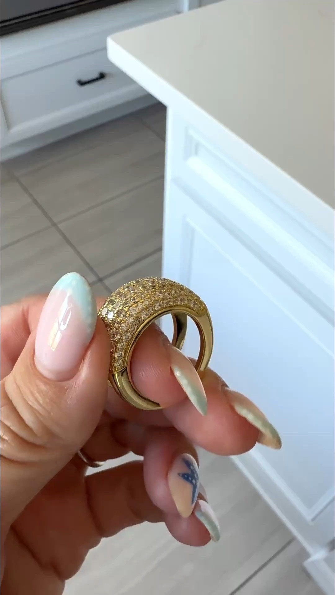 Such a cute way to dress up a smart ring. ✨

I love wearing my smart ring every day, but sometimes I want it to look more like jewelry with a dressier outfit. This sparkly Amazon cover slips right over it and also gives it a little extra protection from scratches. Mine is yellow gold, but it comes in white gold too. Same size as my smart ring worked perfectly for me.

smart ring cover, smart ring accessories, ring cover jewelry, Amazon accessories, gold statement ring, stackable rings, dressy jewelry, affordable Amazon finds

#LTKootd #LTKdayinmylife #LTKU