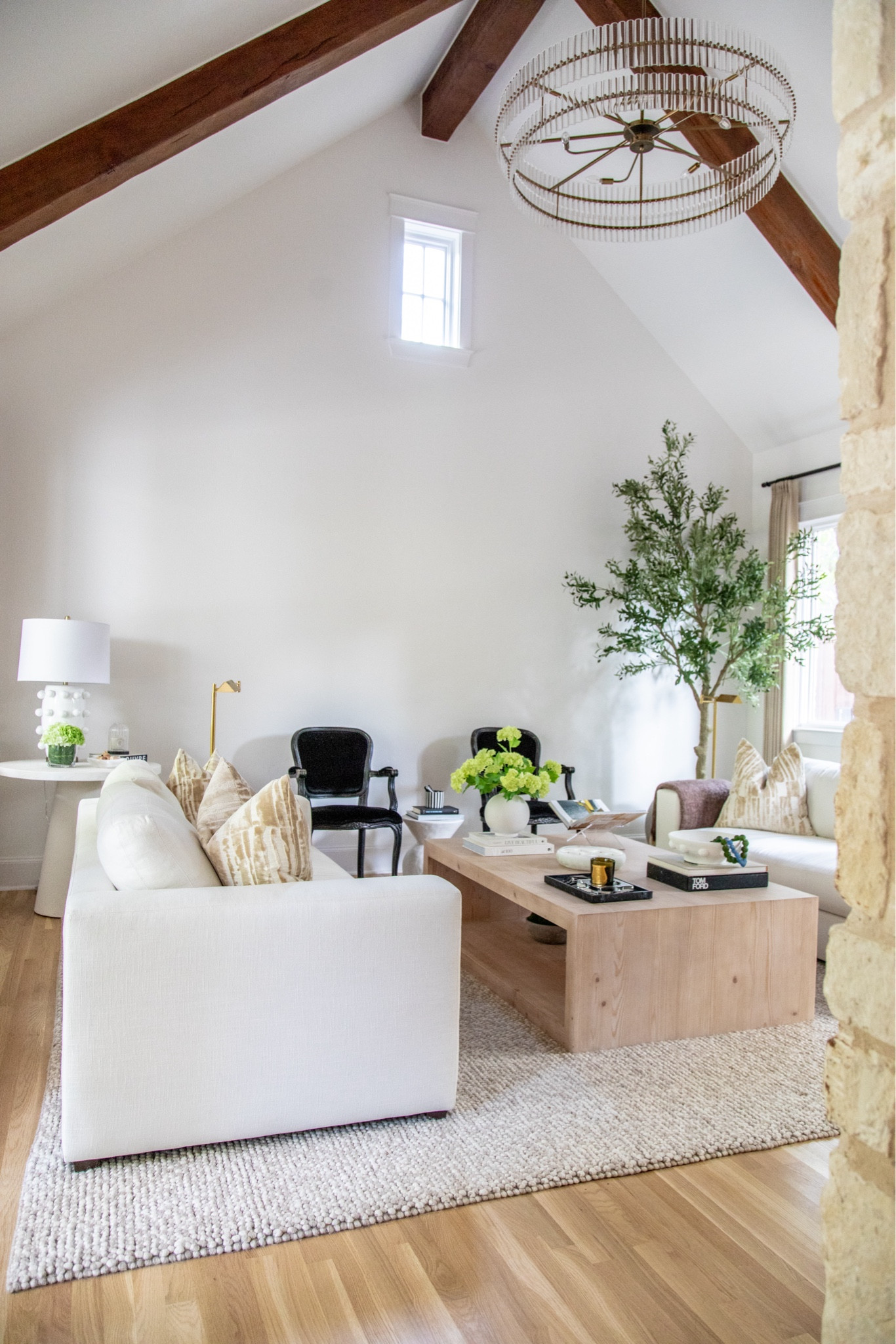 Love the way my living room turned out! These sofas were such a good purchase, and the brass chandelier is everything! This large coffee table is a great size for the cost, and my olive tree + affordable curtains are a best seller!

#LTKHome #LTKFindsUnder50 #LTKSaleAlert