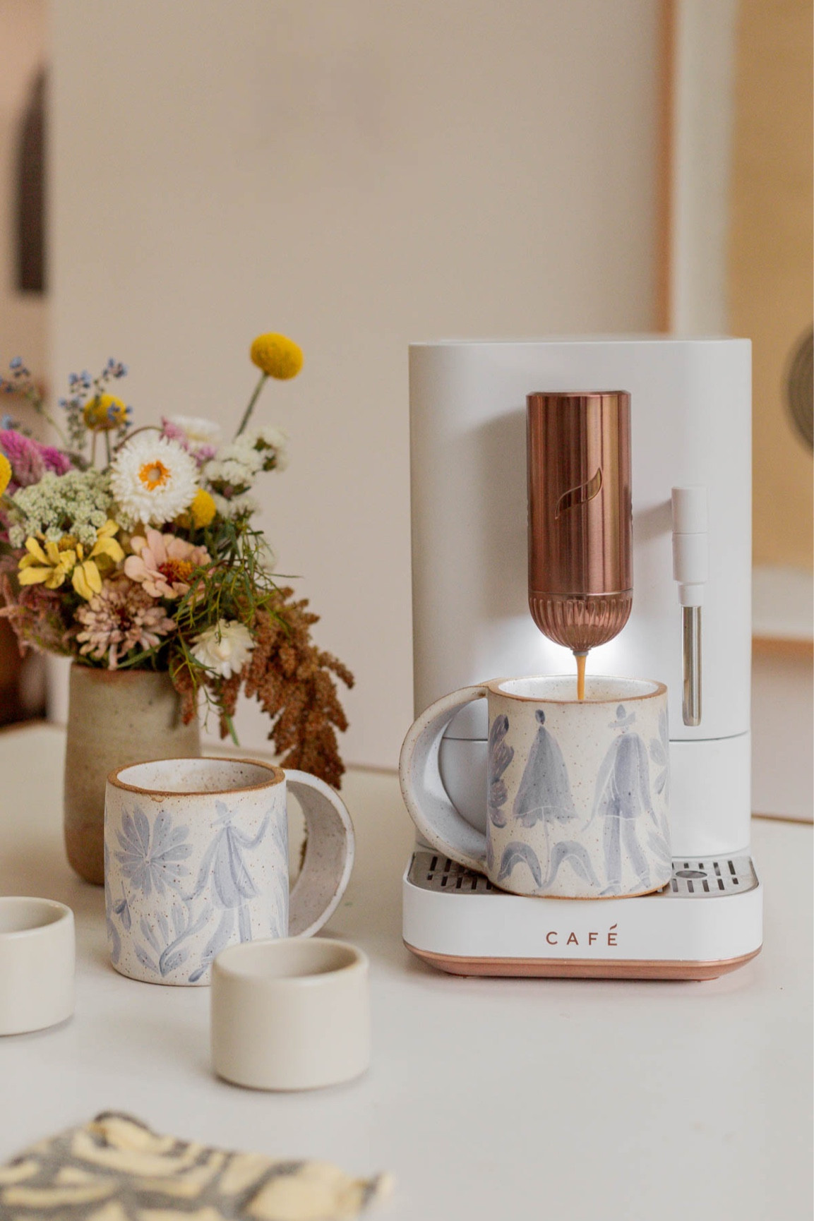 Seriously soooo happy we got this coffee / espresso machine. Jeff and I use it multiple times a day - makes really good americanos (and lattes). Small kitchen appliances - coffee maker - cafe appliances - coffee lovers gift guide - gifts for mom - gifts for in-laws

#LTKGiftGuide #LTKhome