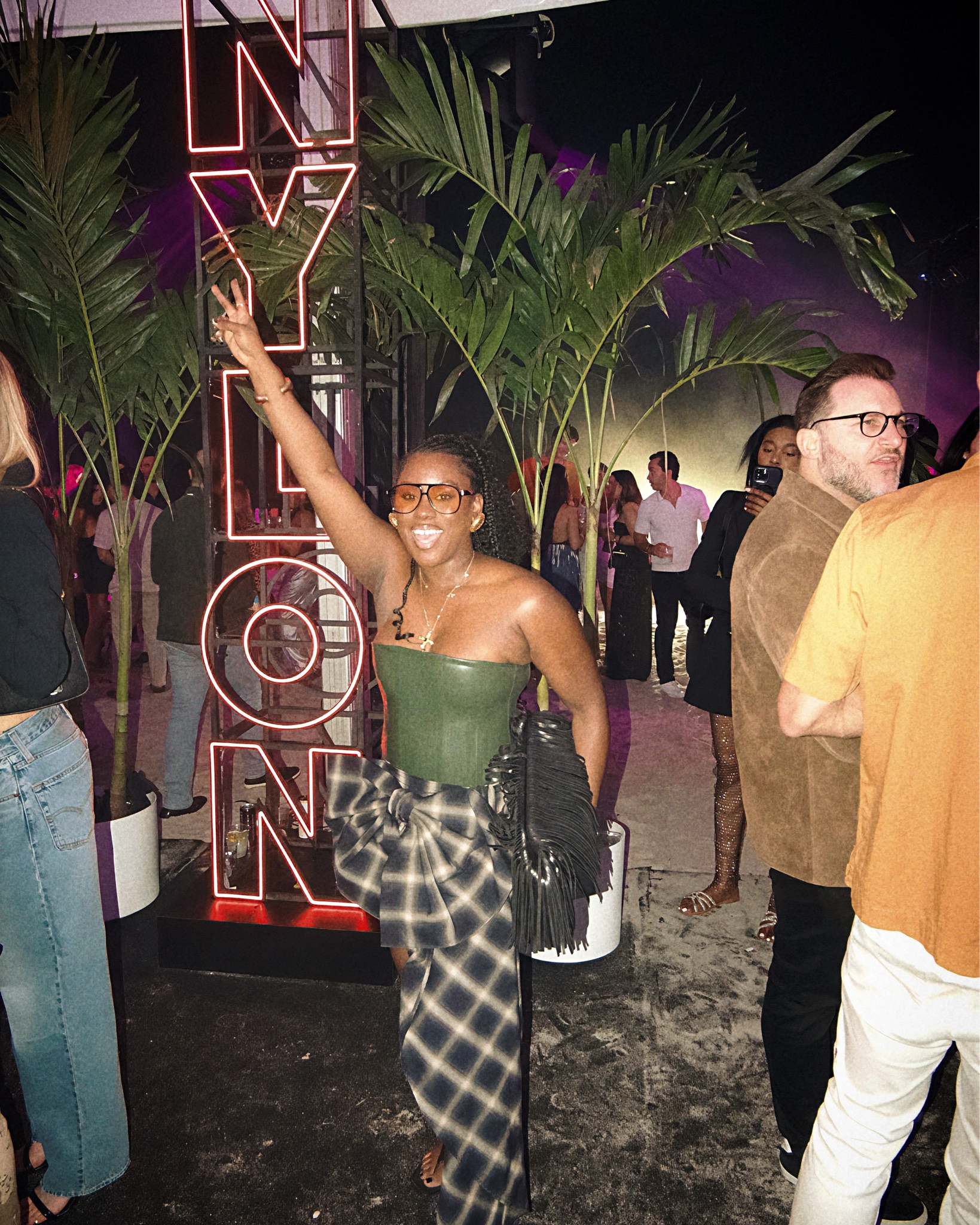 Paid mini skirt with a train and latex corset 