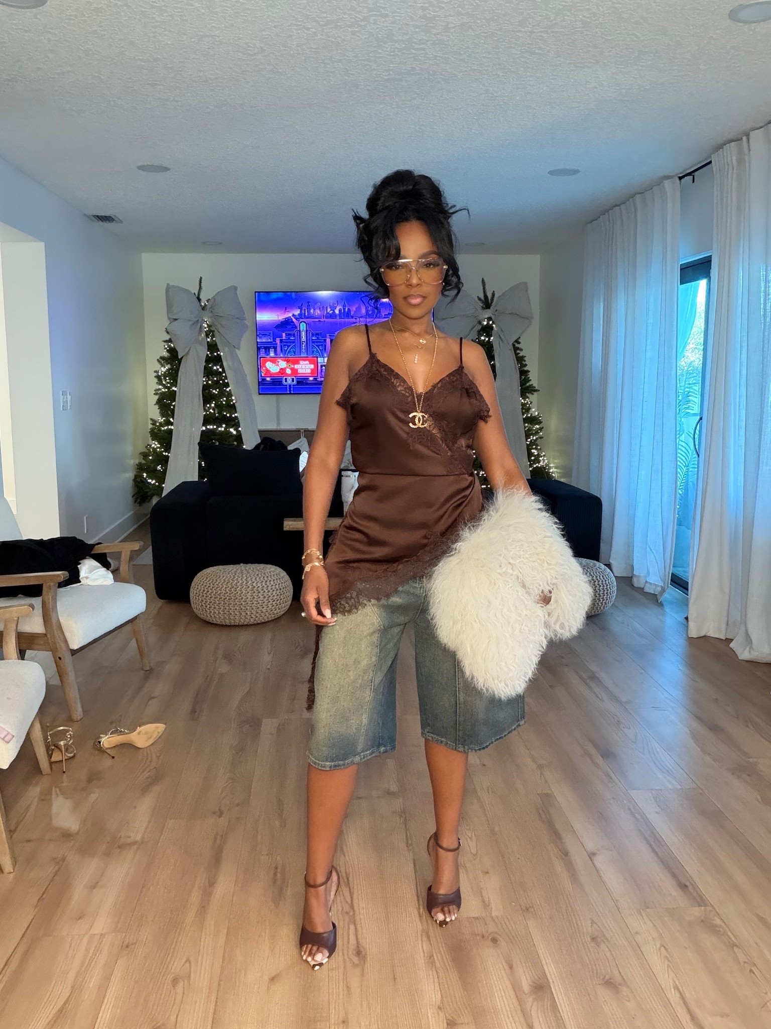 A chic play on textures — the satin cami, relaxed denim bermudas, and the plush statement bag make this look effortlessly cool. Perfect for those nights you want something elevated but still unexpected.

Perfect for holiday gatherings, dinner dates, and casual-glam outings.

📏 Sizing: Cami — Small | Shorts — Small  
Height — 5’4” | 138 lbs | Bust — 34D | Waist — 27" | Hips — 40"

Tap to get details — everything is linked for easy shopping.

Brown satin outfit ideas, elevated casual holiday look, glam winter styling, statement accessories, relaxed denim trends, chic neutral outfit inspiration

Follow me on Instagram and YouTube @kirasfashionfinds

#LTKgrwm #LTKootd