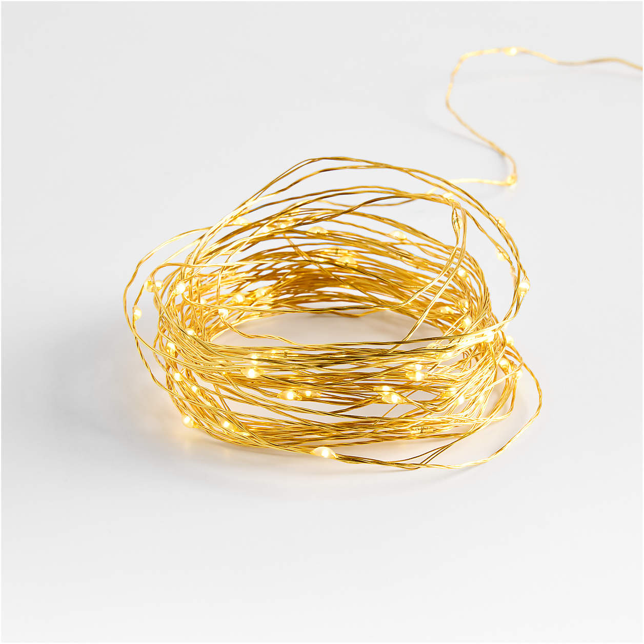 Twinkle Gold 10' Outdoor Patio String Lights + Reviews | Crate & Barrel | Crate & Barrel