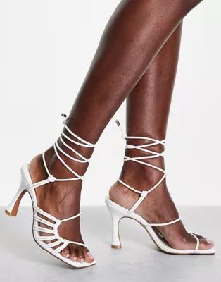 ASOS DESIGN Herald knotted caged tie leg mid heeled sandals in white | ASOS (Global)
