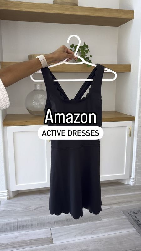 Amazon active dresses.
Wearing XS in both, tts and I’m 5’2”. Colors are black and Grey Sage and both come with pockets, bra shelf, soft, stretchy. The grey sage comes with adjustable straps and built-in shorts. The black comes with separate shorts.
White sandals fit tts.
New Balance sneakers  fit tts.
Puffer bag and hat are also linked.
Active dress, pickleball outfit, golf outfit, tennis dress, Disney outfit, casual outfit, vacation outfit, spring vibes, spring outfit, summer outfit, workout outfit, athletic dress, white sneakers, fashion over 40, petite fashion.

#LTKActive #LTKfitness #LTKover40