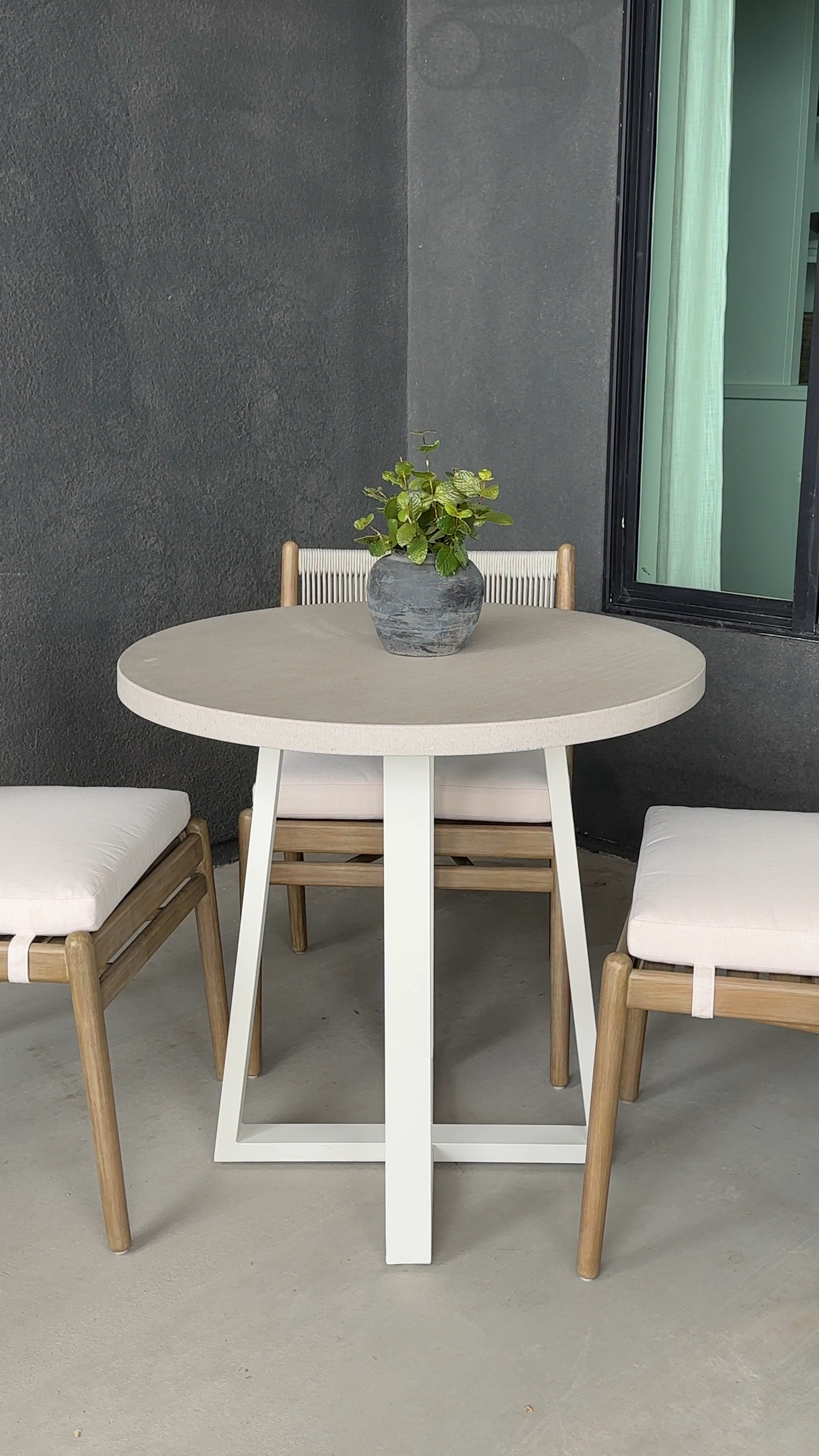 Outdoor dining table perfect for a smaller space and comes in a two different colors! Iron base with stone stop makes it durable for the exterior spaces! 

#LTKSeasonal #LTKhome