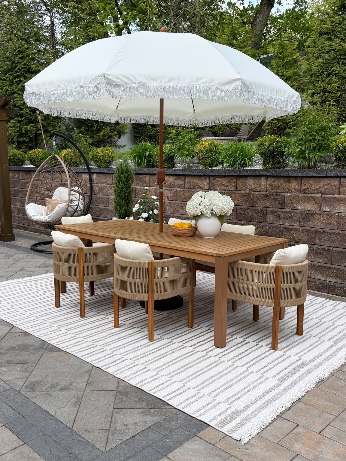 This outdoor setup turned out even better than imagined 🤍🌿✨

The warm wood tones, woven textures, oversized umbrella, and layered details brought together that cozy, elevated, designer-inspired look so effortlessly 😍

It feels calm, inviting, and perfect for slow summer nights outside ☁️✨

#patiodecor #outdoorliving #neutralhome #modernorganic #designerlookforless #outdoorinspo #backyardgoals #cozyhome

#LTKSaleAlert #LTKHome #LTKSeasonal
