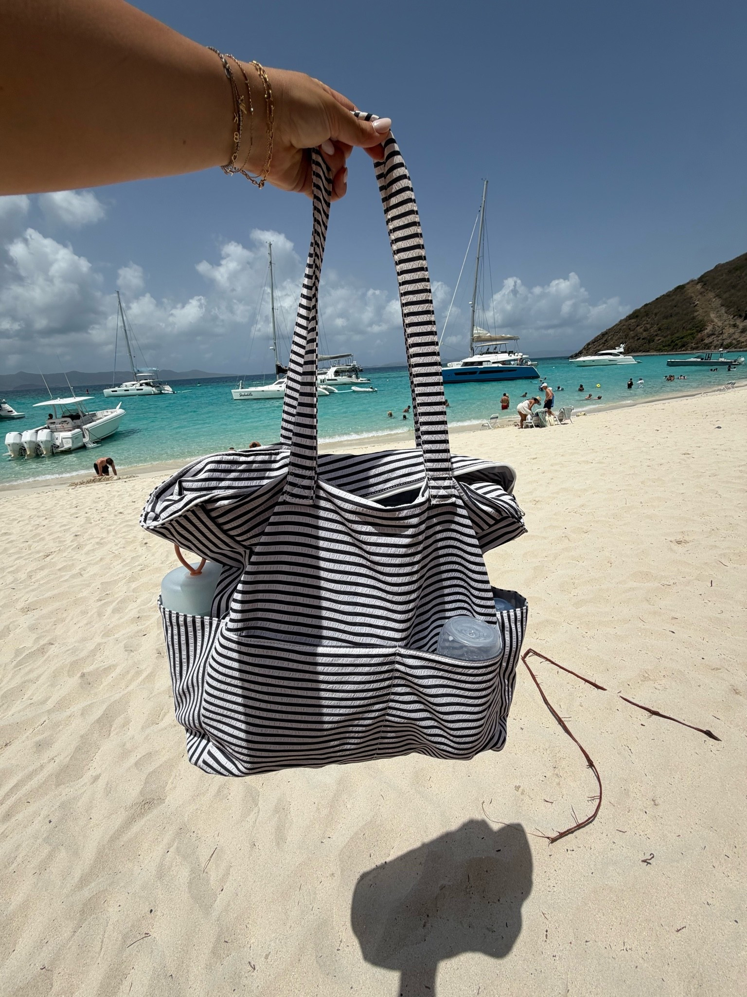 My beach bag / carry on bag for this trip.

#LTKSeasonal #LTKTravel #LTKmomlife