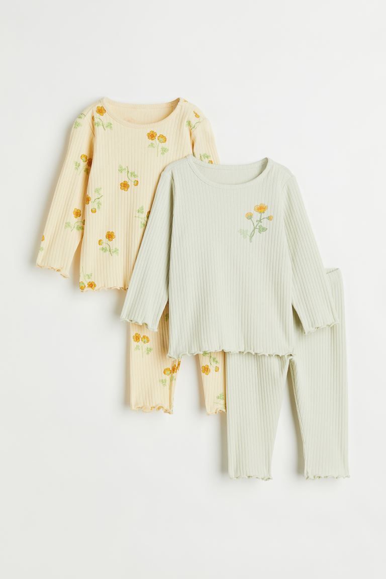 Conscious choice  New ArrivalPajamas in ribbed cotton jersey. Long sleeved tops with concealed sn... | H&M (US + CA)