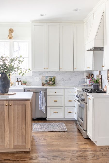 White and wood kitchen with marble countertops, white kitchen, wood kitchen island, brass hardware, runner rug, faux branches, Amazon home, amber Lewis, rejuvenation 

#LTKhome #LTKSeasonal