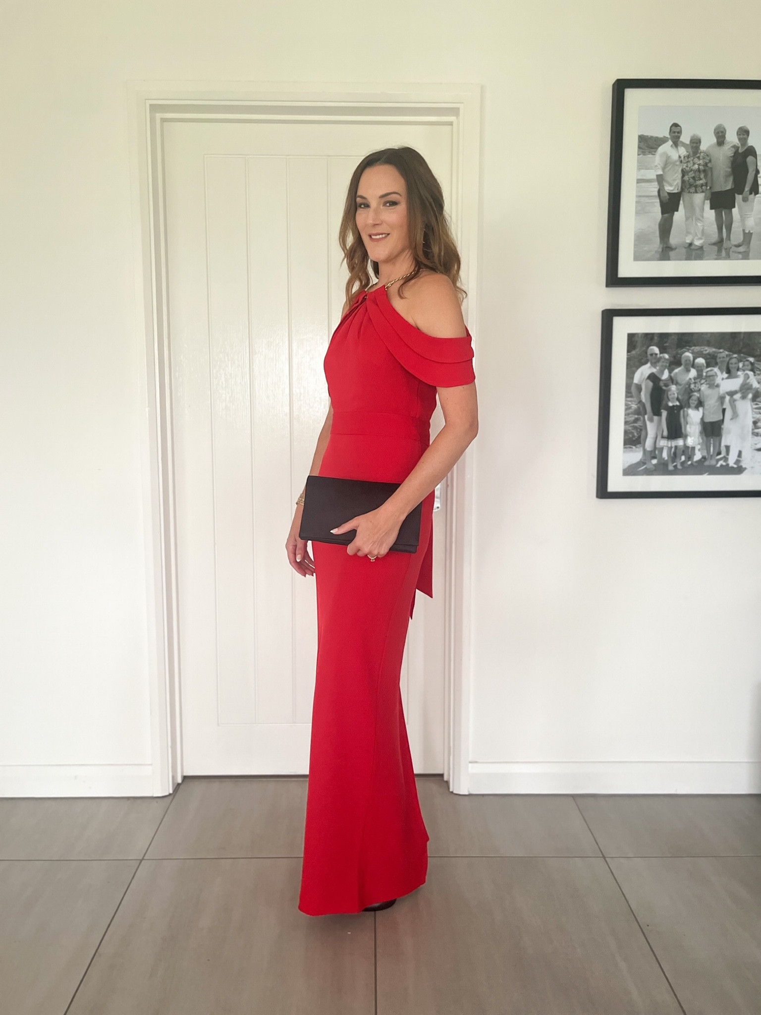 Red maxi dress, halterneck, off the shoulder, black clutch bag

#LTKwedding #LTKeurope #LTKSeasonal