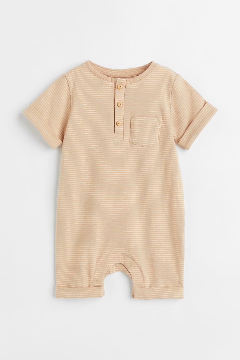 Conscious choice  Baby Exclusive. Romper in soft organic cotton slub jersey with a button placket... | H&M (US + CA)