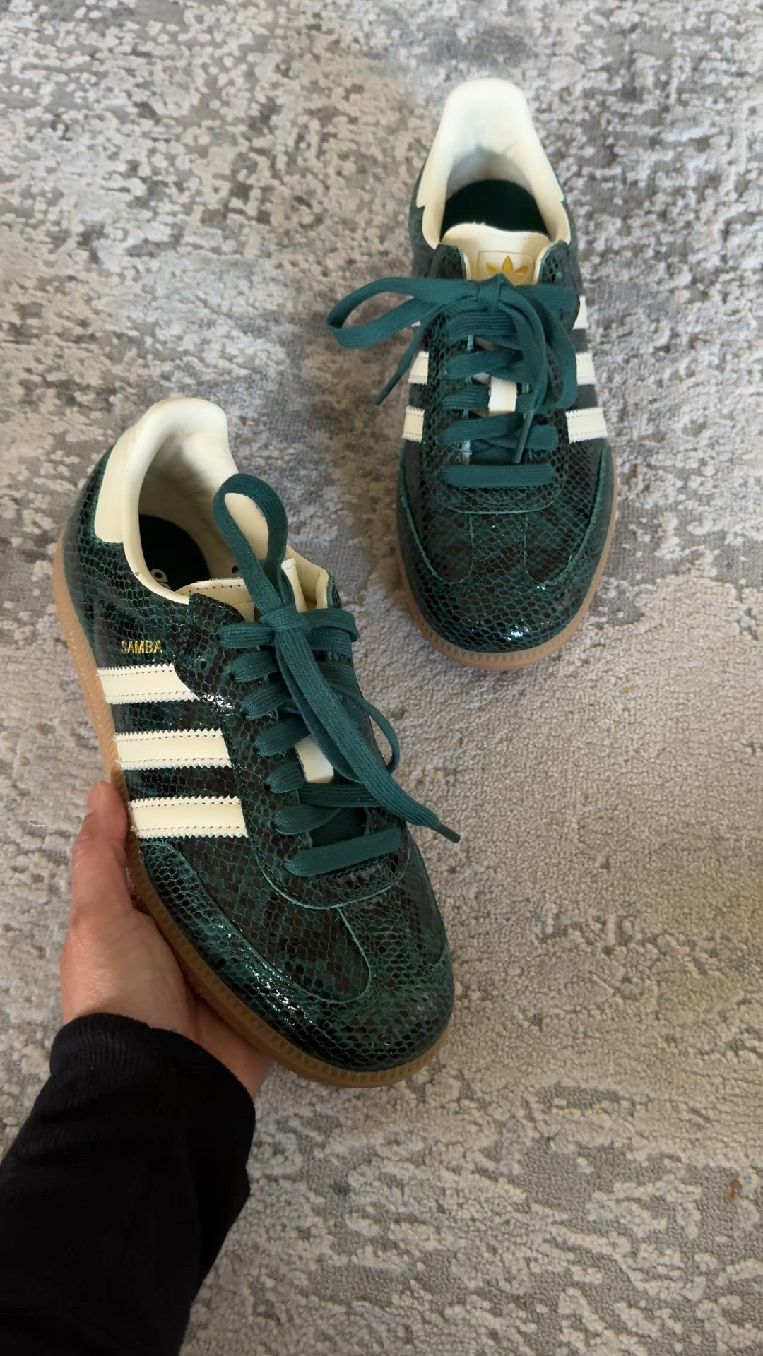 Fall sneakers. Fall shoes. 
I love this dark green color and the subtle snakeskin texture finish. Also comes with cream colored laces. I wear a 6-6.5 and took a 6 in these sneakers. Also comes in a dark gray color as well. 


#LTKShoeCrush #LTKOver40 #LTKFindsUnder100