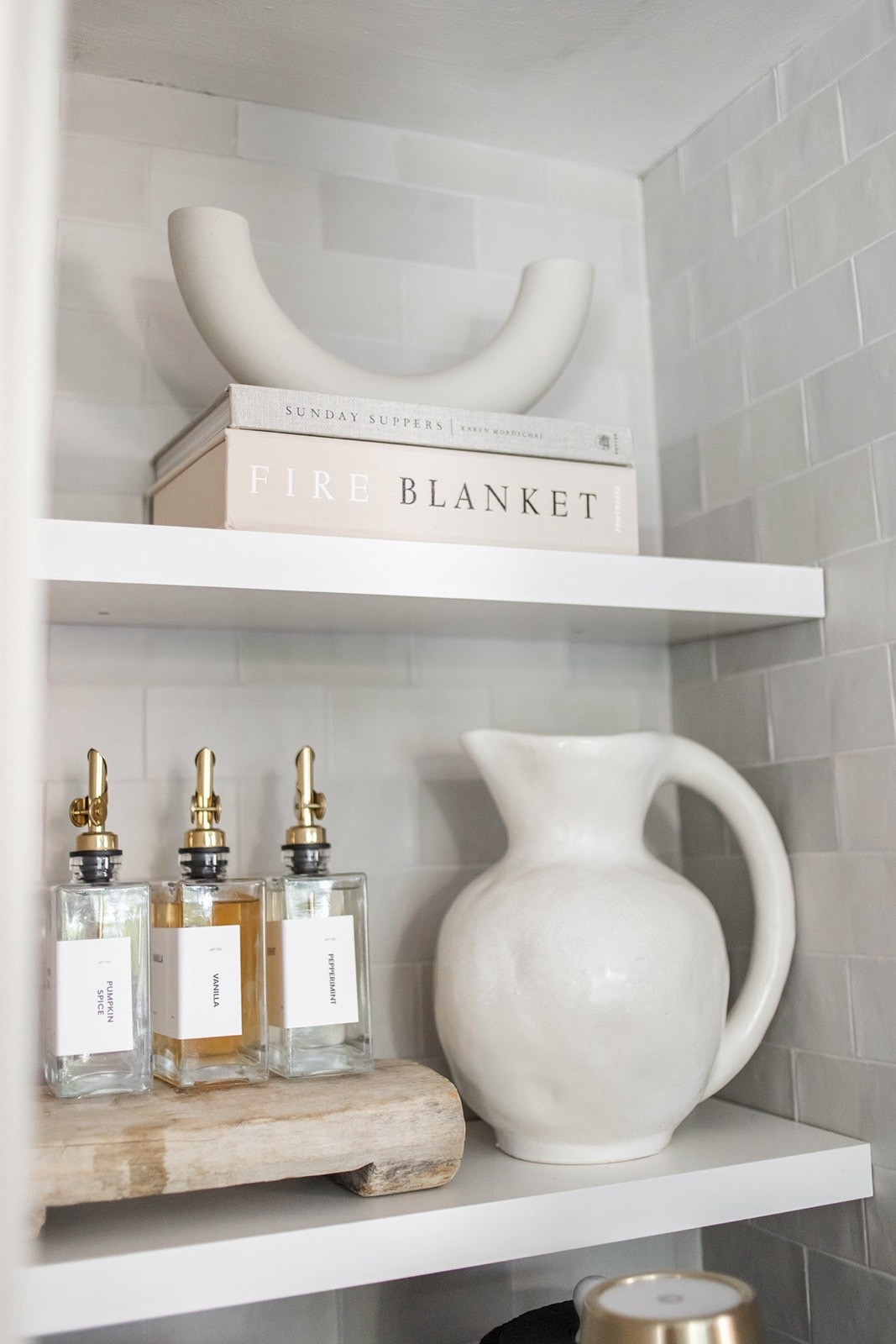 Simple shelf styling with pieces that feel calm, intentional, and lived in.
Neutral ceramics, warm wood, and layered textures are my go-to for creating a collected look that doesn’t feel cluttered.


#LTKHome #LTKFindsUnder50 #LTKSaleAlert