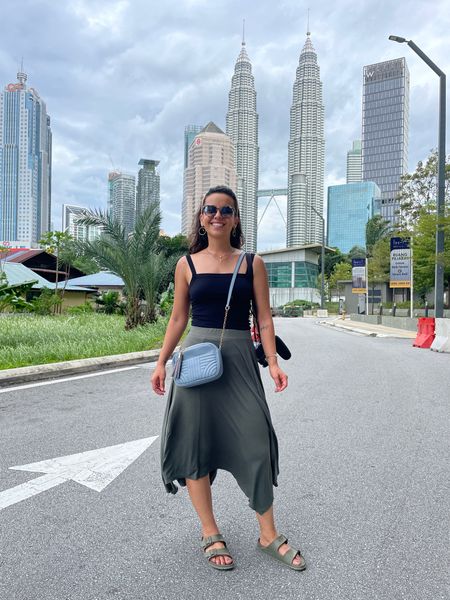 Easy breezy look from Kuala Lumpur 🇲🇾 always pack a midi skirt. You can style them in so many different ways!!! 

#LTKtravel #LTKstyletip #LTKunder100