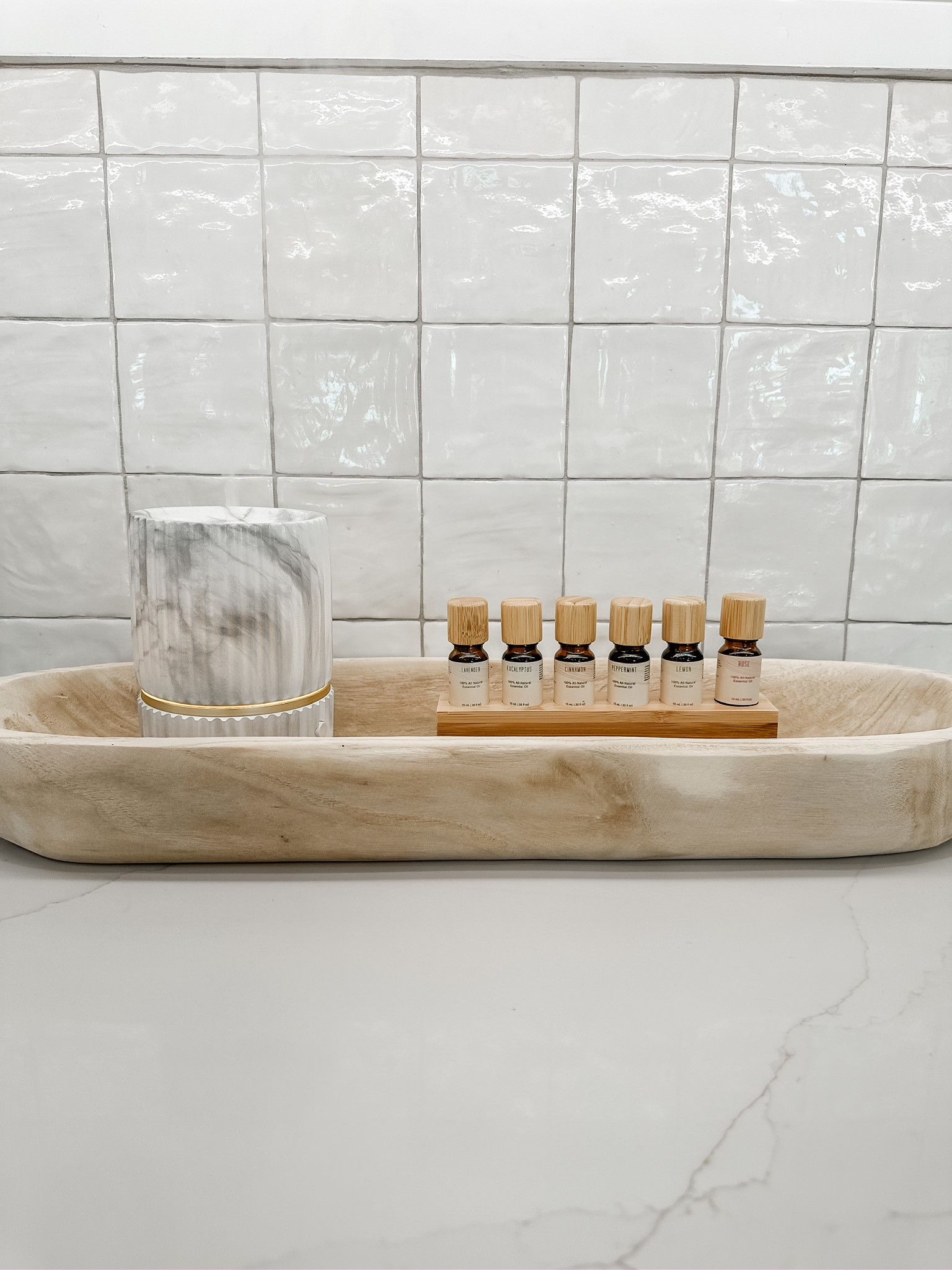 New oil diffuser setup! Found this marble diffuser and oil organizer at Walmart!

#LTKFind #LTKunder50 #LTKhome