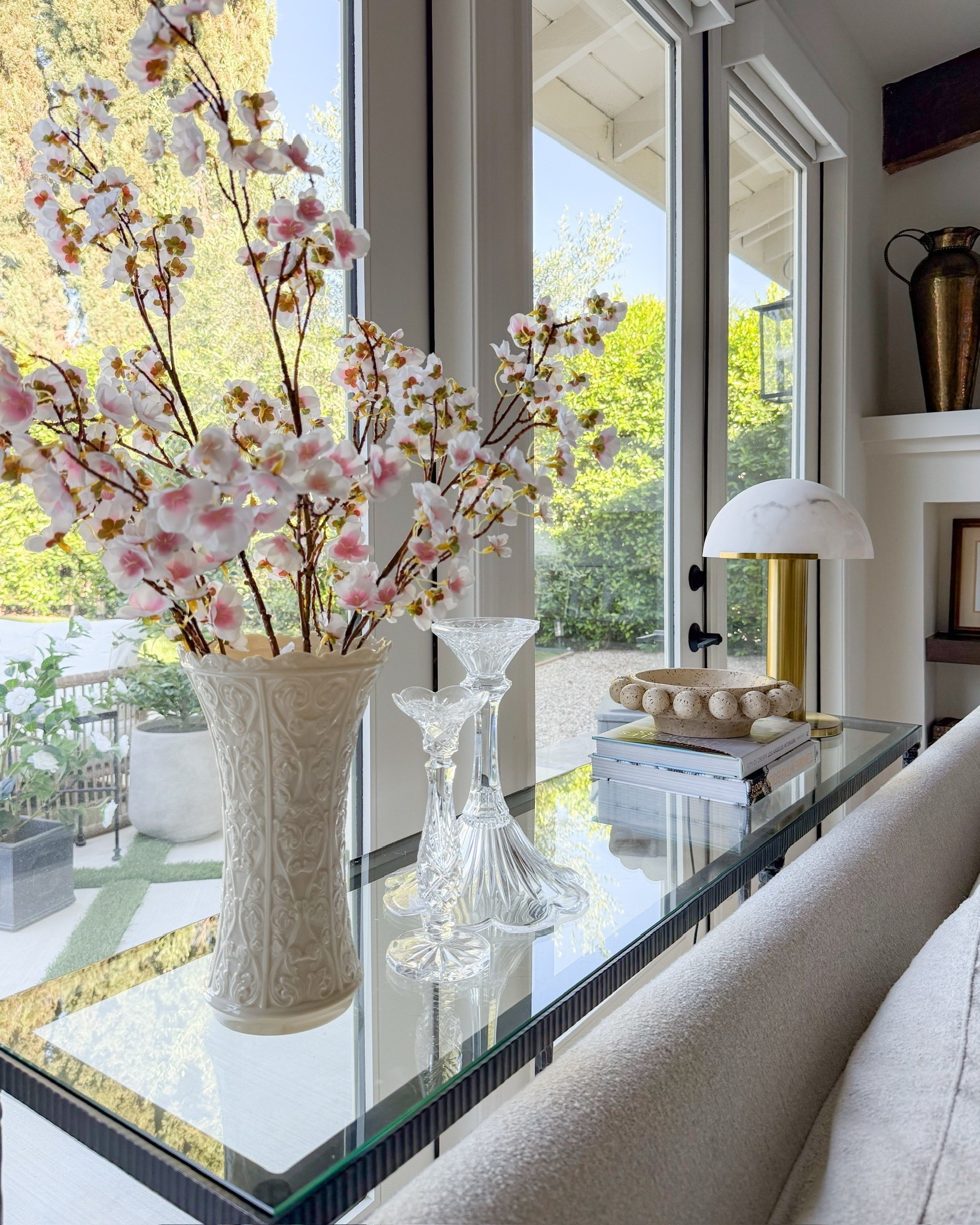 I've been obsessed with these cherry blossom stems! Perfect pop of soft pink! And in love with my new look for less alabaster lamp that looks so high end!

#LTKvlog #LTKSeasonal #LTKHome