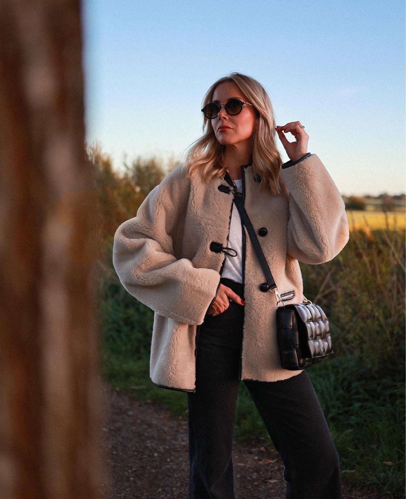 Shearling jacket
Toteme Mango coat 
Straight jeans 

#LTKstyletip #LTKSeasonal #LTKunder100
