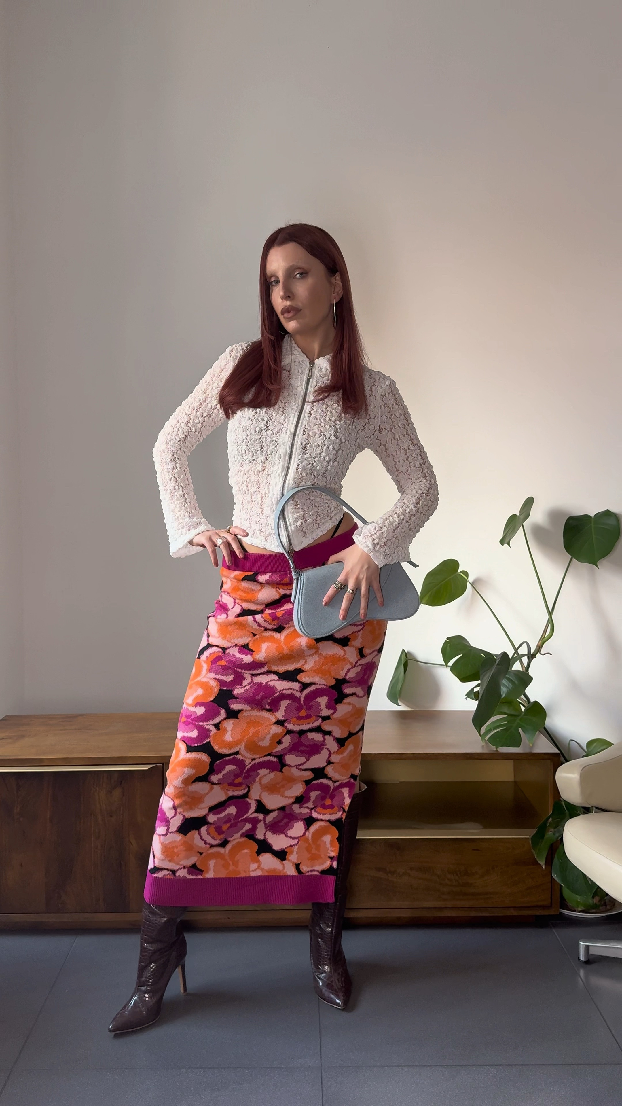 Styling a knitted midi skirt for autumn/ winter ❄️ 

. 

💗 Style tip:  Lately, I’m all about clashing colours, prints, and textures—basically pairing things that shouldn’t work but do. Think Miu Miu, Gucci and Prada…

For this look, I’ve styled a white lace shirt with a pink-and-orange floral knit midi skirt, brown croc knee-high boots and a denim bag for that grandma-chic vibe. Obvs, I had to add some edge: the skirt sits low-waist to show a peek of my knickers, and I cinched the shirt at the waist with a DIY hack using a hairband. Slightly chaotic but it works 

. 

💗 Save this look for later

#winterfashion #autumnoutfitinspo #festiveoutfit #outfitinspo #winteroutfit



#LTKstyletip #LTKwinter #LTKgrwm