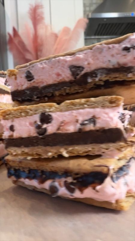 These Chocolate Covered Strawberry Frozen S’Mores are delicious, try this recipe!! 🍫 🍓 I’ve linked everything to save you time.  ❤️ 

Ingredients 

1 box Graham Crackers
3 oz dark chocolate pudding
1 cup mini chocolate chips 
8 oz marshmallow fluff
8 oz frozen whipped topping
4 oz cream cheese
strawberry extract to taste 

#nobakedessert #smores #frozensmores #valentinesdaydessert

#LTKfamily #LTKhome #LTKVideo