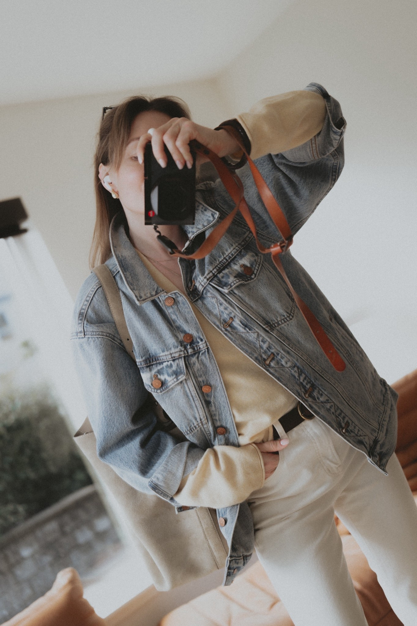 For whenever the weather can’t decide 🌞 ☁️ ⛅️ : layering @guestinresidence Everywhere cardigan with an oversized trucker jacket @Madewell (similar linked rn, my own will be available on Poshmark soon 🔜) + white jeans @Levi's 501 + Toteme belted tote in suede. 

#LTKootd #LTKSeasonal