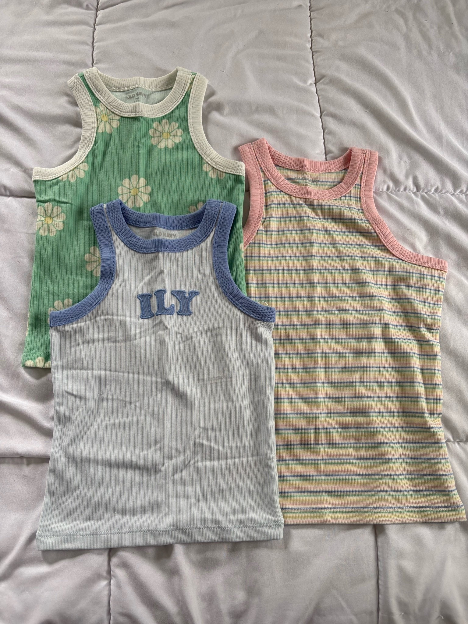 Cutest racer back tanks for girls under $10

#LTKSaleAlert #LTKSeasonal #LTKKids