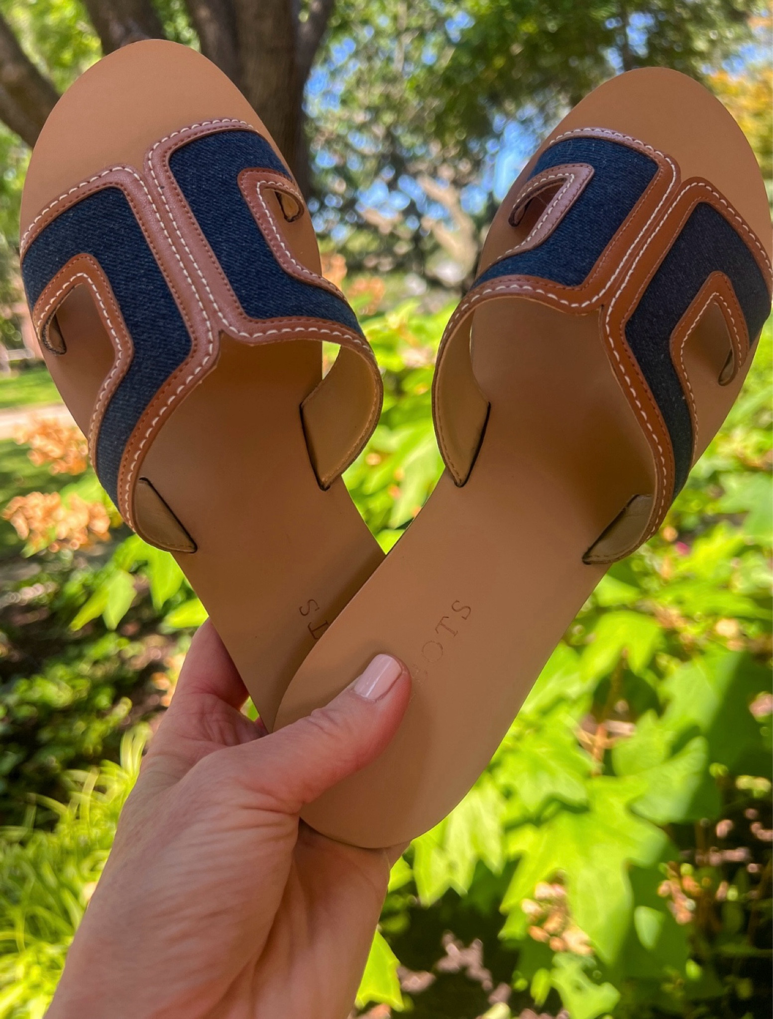 Love these darling denim and leather slides! Pair with a white or solid color dress and a denim jacket for a cute summer outfit when you’re in an air conditioned space.

30% off right now and going fast!



#LTKShoeCrush #LTKSeasonal #LTKFindsUnder50