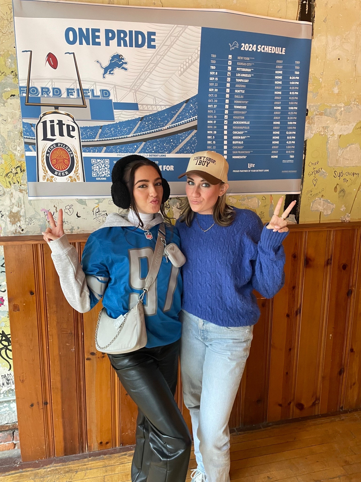 Chilly Tailgate OOTD feat. Maya! It was FREEZING this day, and we both wanted to be cozy and layer up just in case we went to an outdoor bar. I layered up with my mom’s vintage Ralph Lauren crewneck sweater, my classic Abercrombie jeans, and a fun hat. Maya went for a jersey and crew neck, and comfy cozy leather pants. I unfortunately left my earmuffs at work, so I sported a hat while Maya got to be extra cozy chic. 