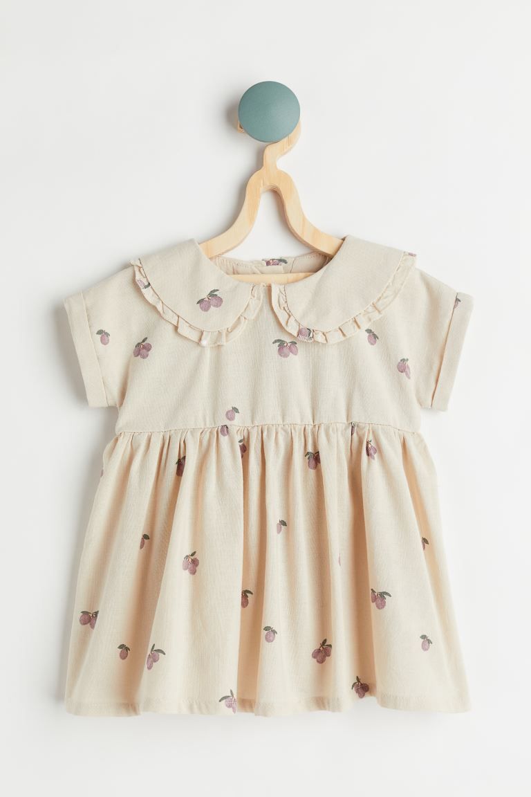 Conscious choice  New ArrivalBaby Exclusive. Dress in woven cotton fabric with a printed pattern.... | H&M (US + CA)