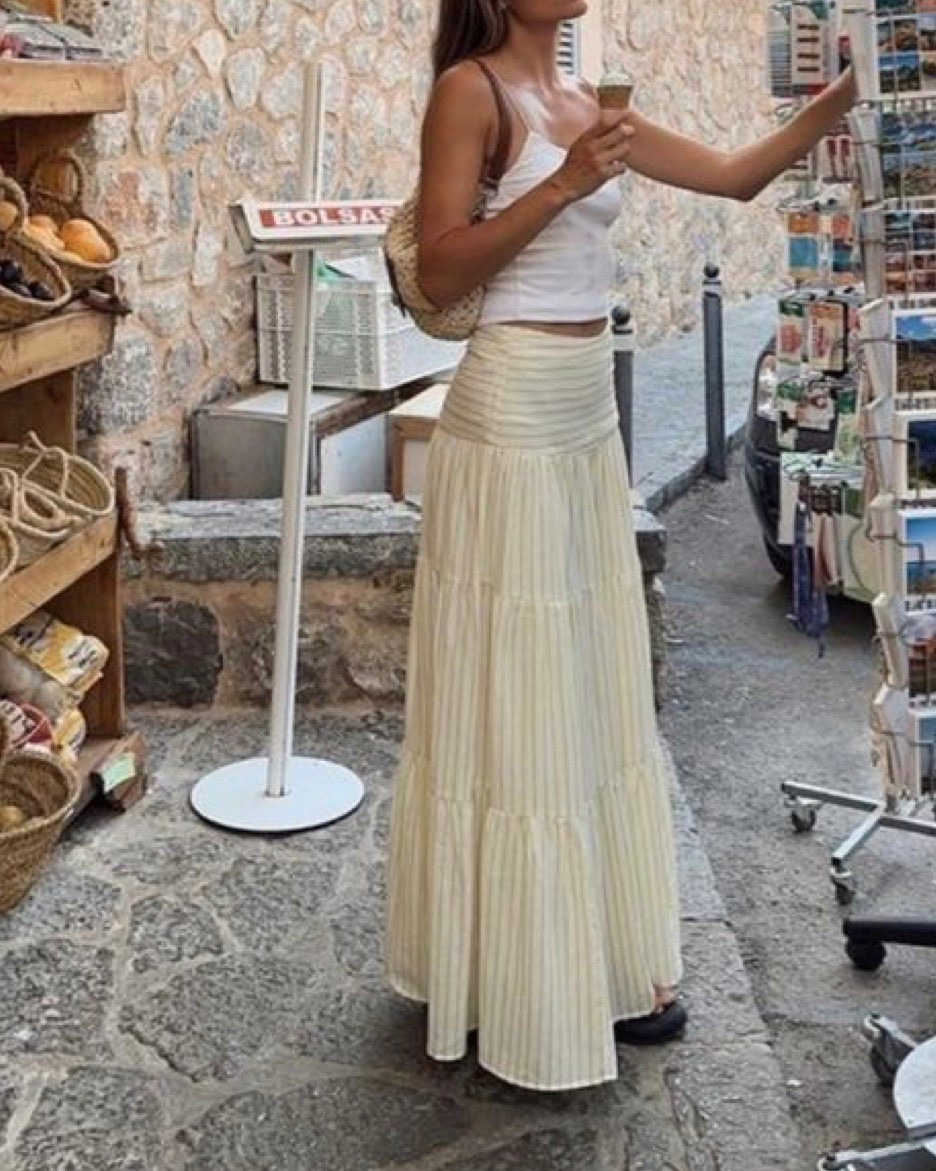 Feel like getting dressed up cool and sexy. Another Euro summer inspired outfit for just that ! Classy and cool yellow maxi skirt paired with simple camisole tank top.  This fit will have you falling in love with your own reflection  💛💛🤍🤍

#LTKFestival #LTKootd #LTKSeasonal