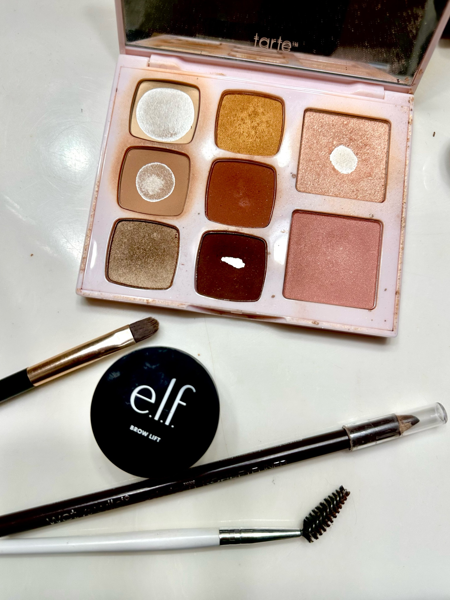 Brow routine. 
I use my flat brush, shadow and pencil to create shape and shading I like, then top with elf brow lift and brush it up to stay all day! 

#LTKStyleTip #LTKFindsUnder50 #LTKBeauty