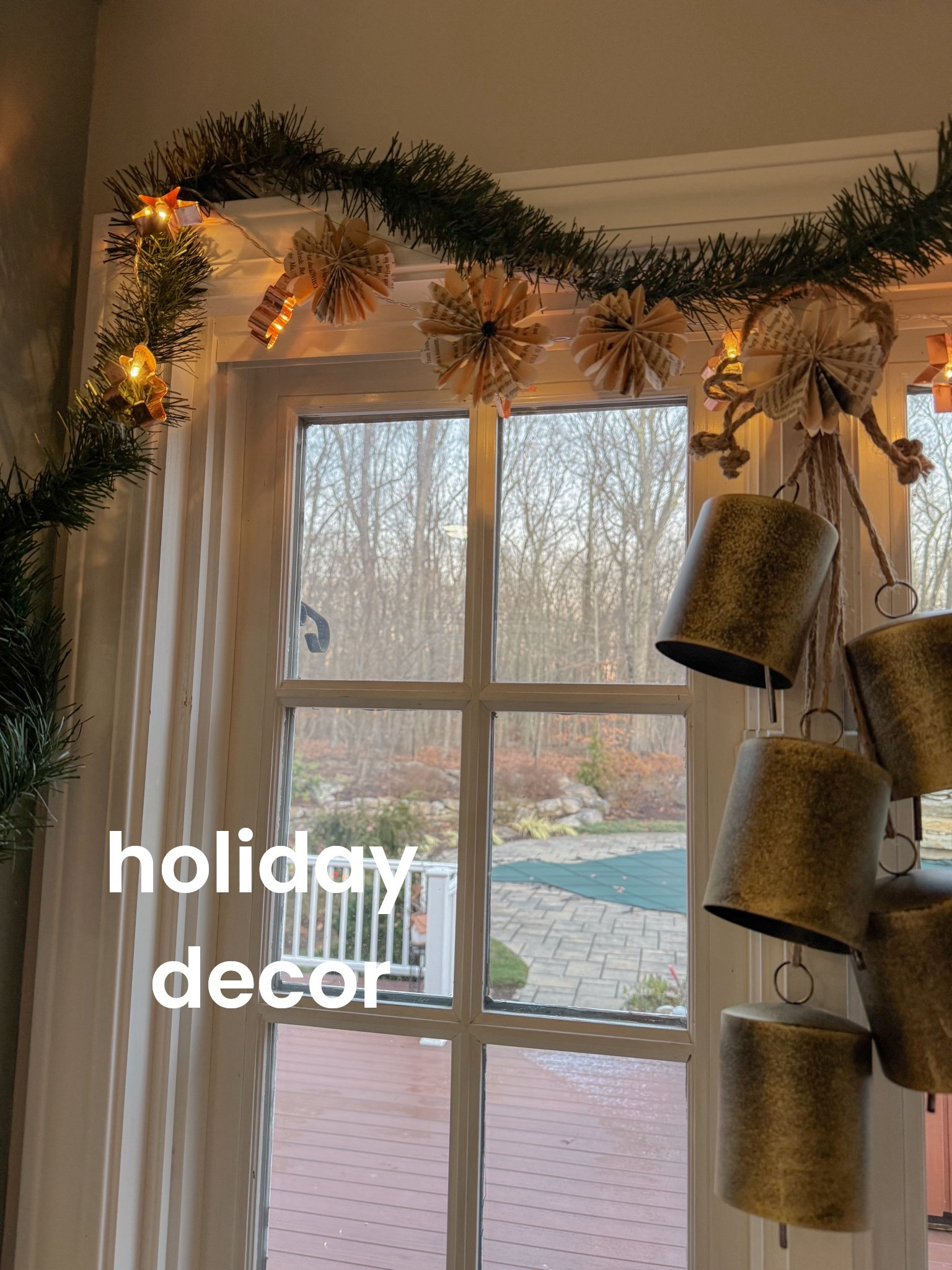 Some Christmas decor over the kitchen window! Garland, lights, bells and I made homemade paper snowflakes ❄️ The reel for the process is on my Instagram. 

#LTKHome #LTKHoliday #LTKSeasonal