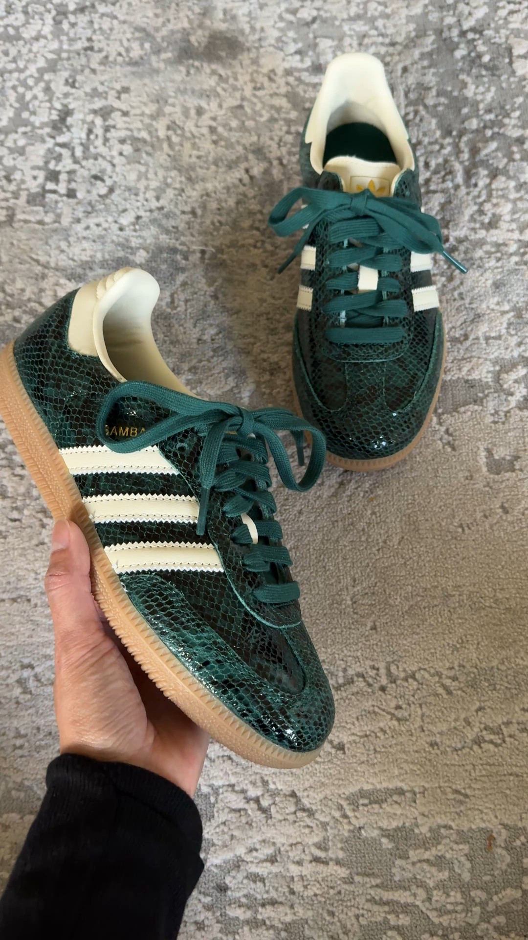 Fall sneakers. Fall shoes. 
I love this dark green color and the subtle snakeskin texture finish. Also comes with cream colored laces. I wear a 6-6.5 and took a 6 in these sneakers. Also comes in a dark gray color as well. 


#LTKOver40 #LTKFindsUnder100 #LTKShoeCrush